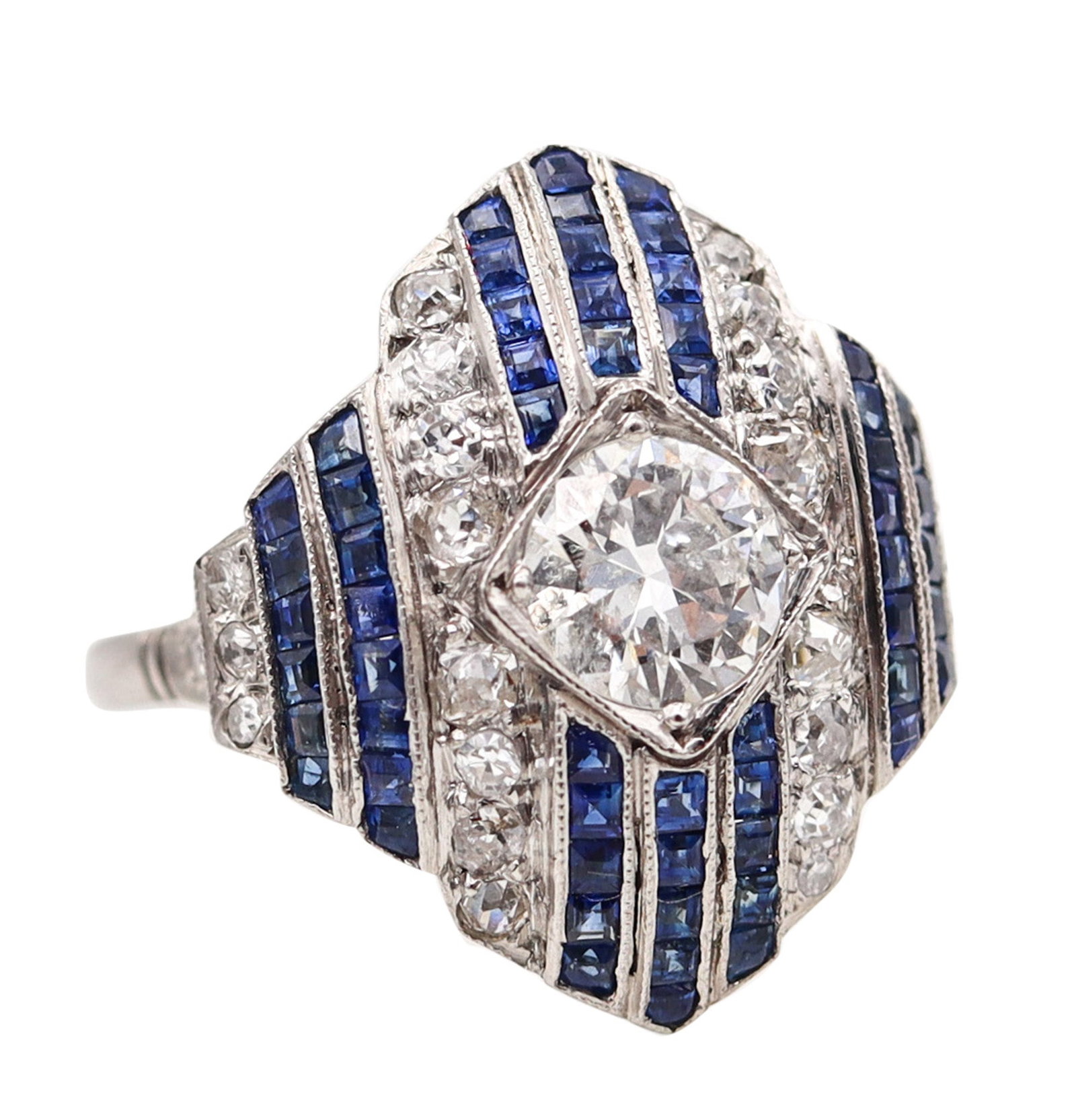 Art Deco 1930 Geometric Ring In Platinum With 3.67 Ctw In Diamonds And Sapphires: Beautiful Art Deco cocktail ring, America, circa 1930, crafted in solid platinum with crisp geometric lines and fine millegrain finishing throughout the settings. Centered with a European-cut round di