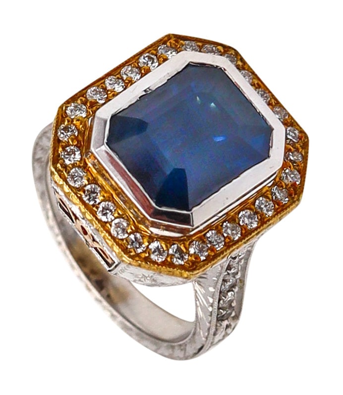 Loree Rodkin Baroque Cocktail Ring In 18Kt White Gold With 5.88 Cts In Sapphire And Diamonds: Statement cocktail ring by Loree Rodkin, crafted in solid 18K white gold with yellow-gold accents and richly incised neoclassical/French Baroque-inspired detailing. Centered with a bezel-set rectangul