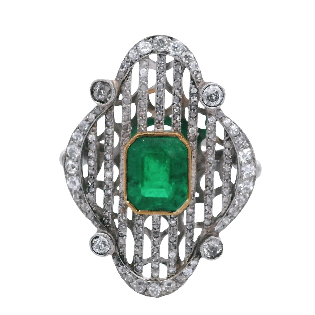 Vintage 18K Yellow & White Gold Ring with 5.10 CTW in Emerald & Diamonds: Impressive vintage ring crafted in 18K yellow and white gold, showcasing an emerald-cut emerald of approximately 3.10 carats with vivid, intense green color, framed by an ornate, openwork diamond surr