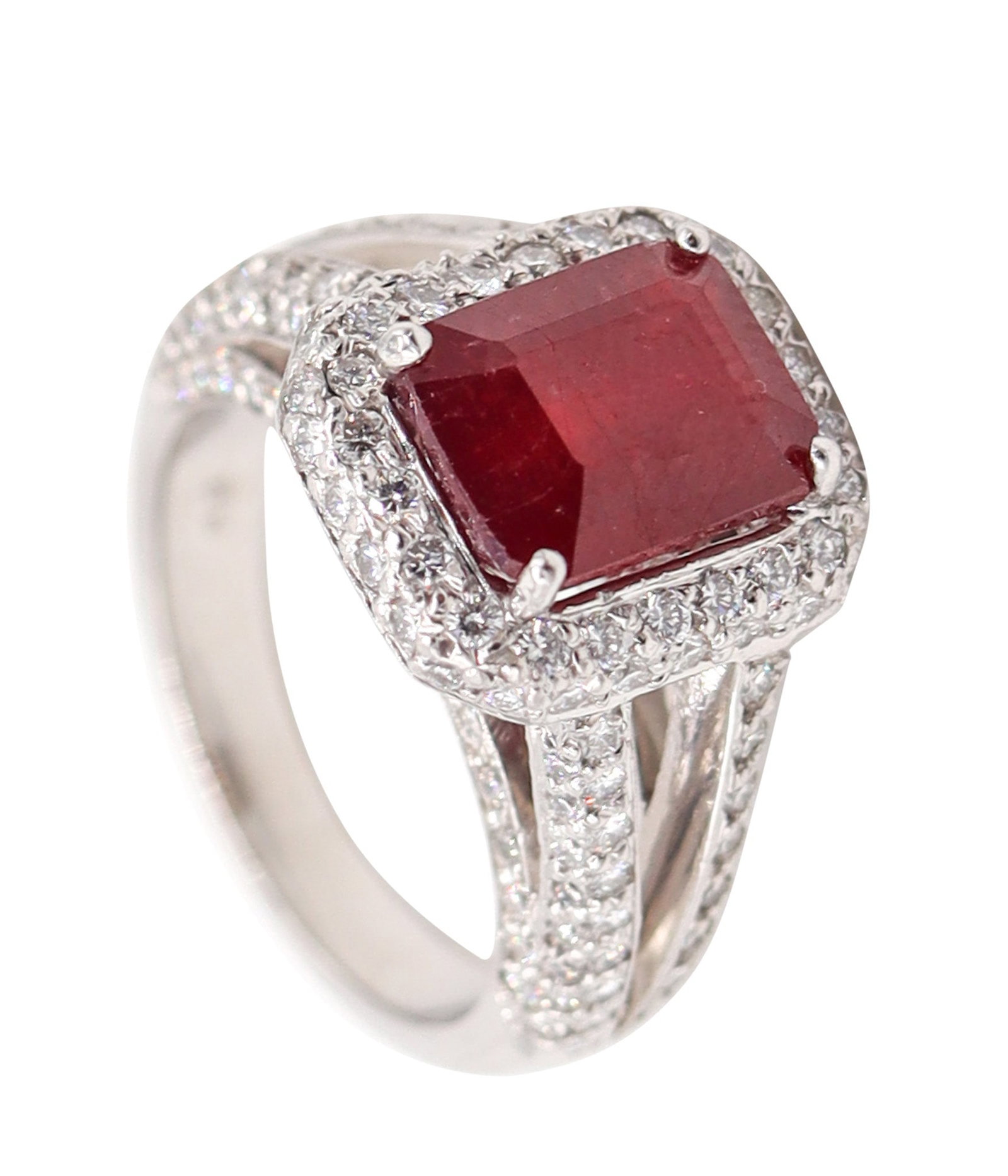 PLATINUM Classic Cocktail Ring With 4.84 Ctw In Vivid Red Ruby And VS Diamonds: Classic platinum cocktail ring with a high-polish finish, centered with a vivid red emerald step-cut ruby in four prongs (7 x 9 x 5mm; approx. 3.14 ct) and surrounded by a rich pavé of 170 calibr