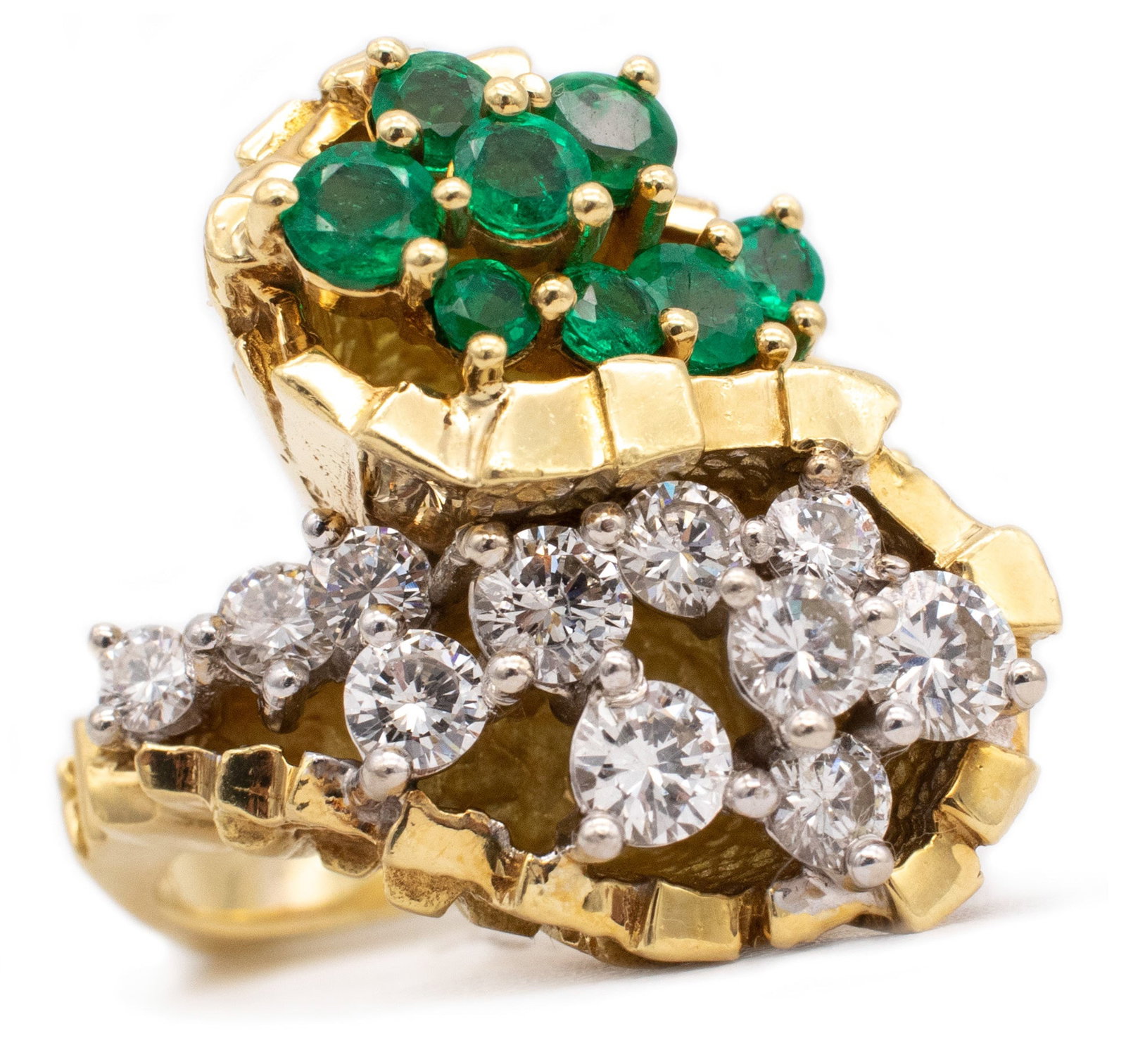 Modernist 1970 Bold Cocktail Ring In 18Kt With 3.15 Cts Of Diamonds And Emeralds: Bold designer ring in solid 18K gold, set across the top with 22 calibrated round brilliants: 11 white colorless diamonds totaling 1.65 ctw (F/G color, VS2 clarity) and 11 vibrant Colombian Muzo emera