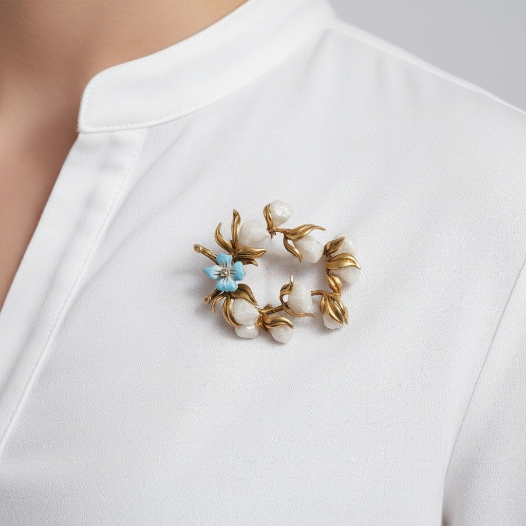 14K Yellow Gold Art Nouveau Brooch with Pearl, Diamond & Enamel: Exquisite 14K yellow gold Art Nouveau (Victorian) brooch, circa 1895–1905, crafted as a floral wreath motif adorned with luminous blister pearls, delicate blue enamel flower detailing, and a dia