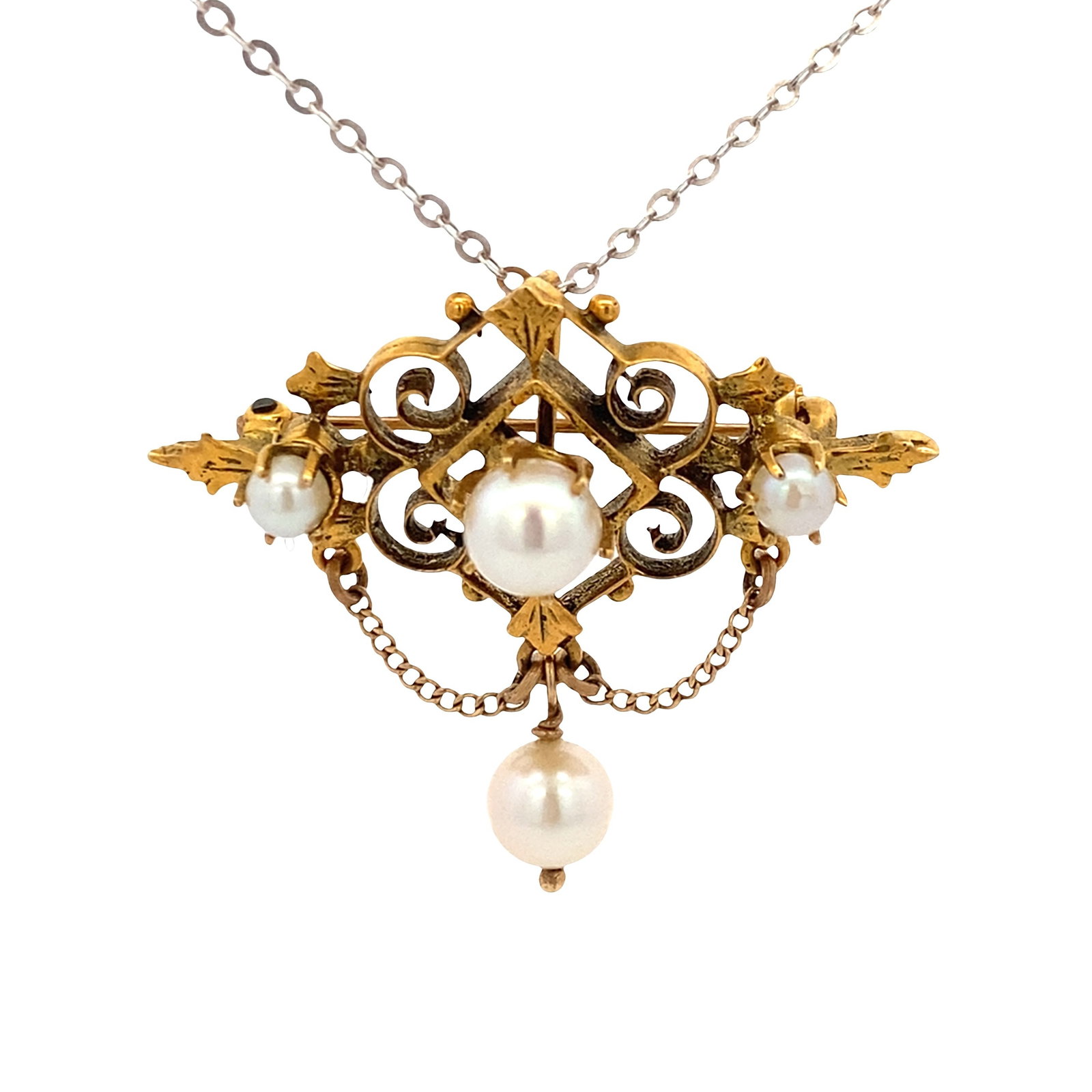 Antique 14K Yellow Gold Pendant/Brooch with Pearls: Charming antique pendant/brooch crafted in 14K yellow gold, featuring an ornate openwork scroll motif accented with four round white pearls, including a graceful drop pearl that adds elegant movement.