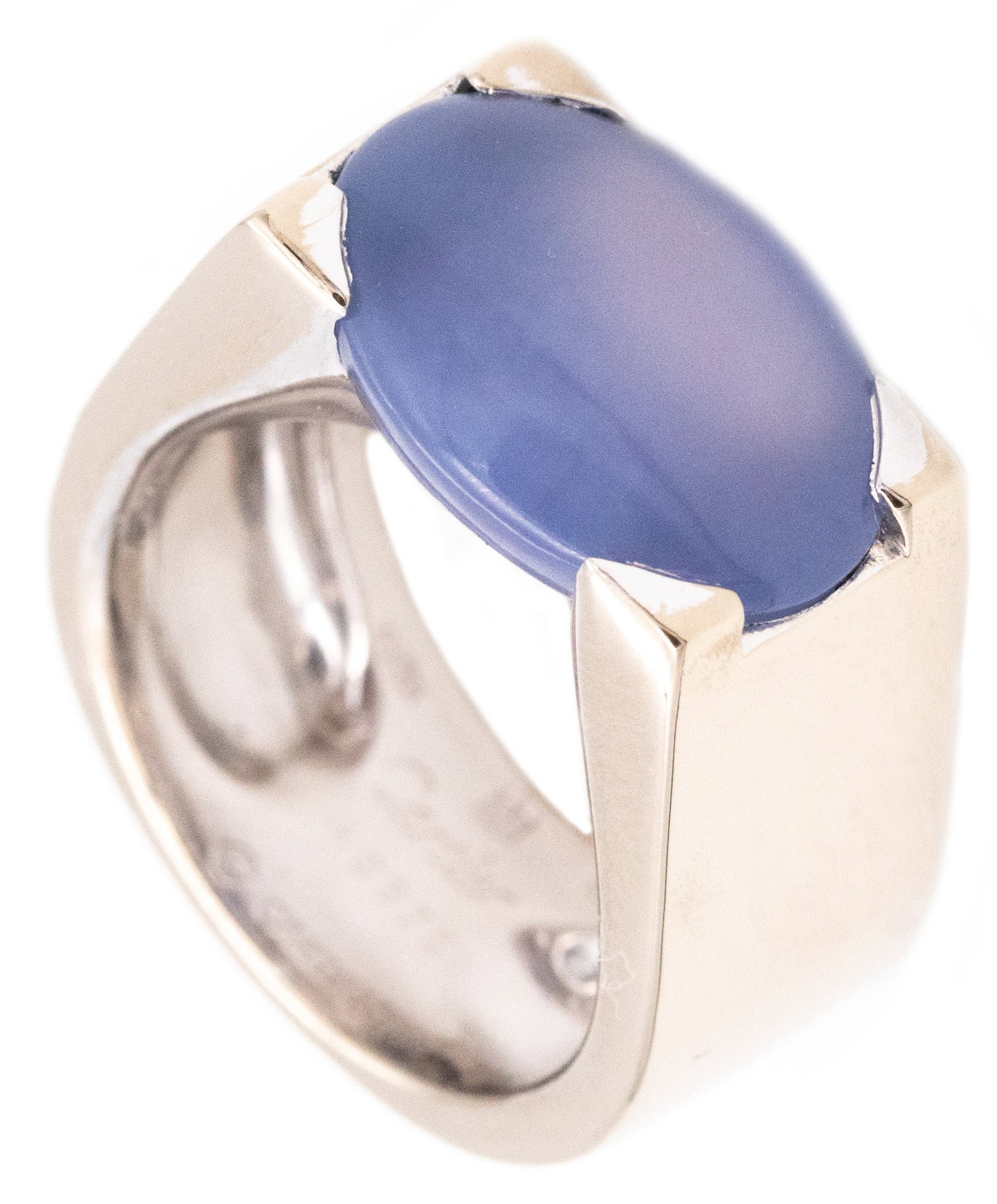Cartier Paris Tankissine Chevalier Ring In 18Kt White Gold With 8.65 Cts Blue Gray Chalcedony: Geometric Cartier Tankissime cocktail ring from the Tank collection, Paris, 1999, crafted in solid 18K white gold with a high-polish finish. Set with an oval cabochon blue-gray chalcedony measuring 10