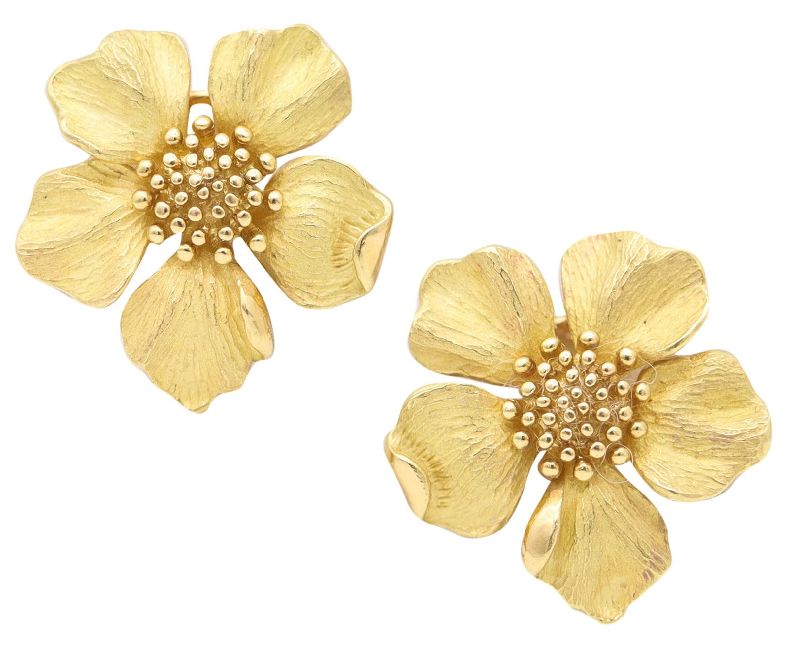 TIFFANY & CO. 1970 Dogwood Flowers Clips-On Earrings In 18Kt Yellow Gold: Vintage Tiffany & Co. Perennial Collection earrings, New York, circa early 1980s, medium size model celebrating North American wildflowers. Hand-crafted in solid 18K yellow gold with richly textured s