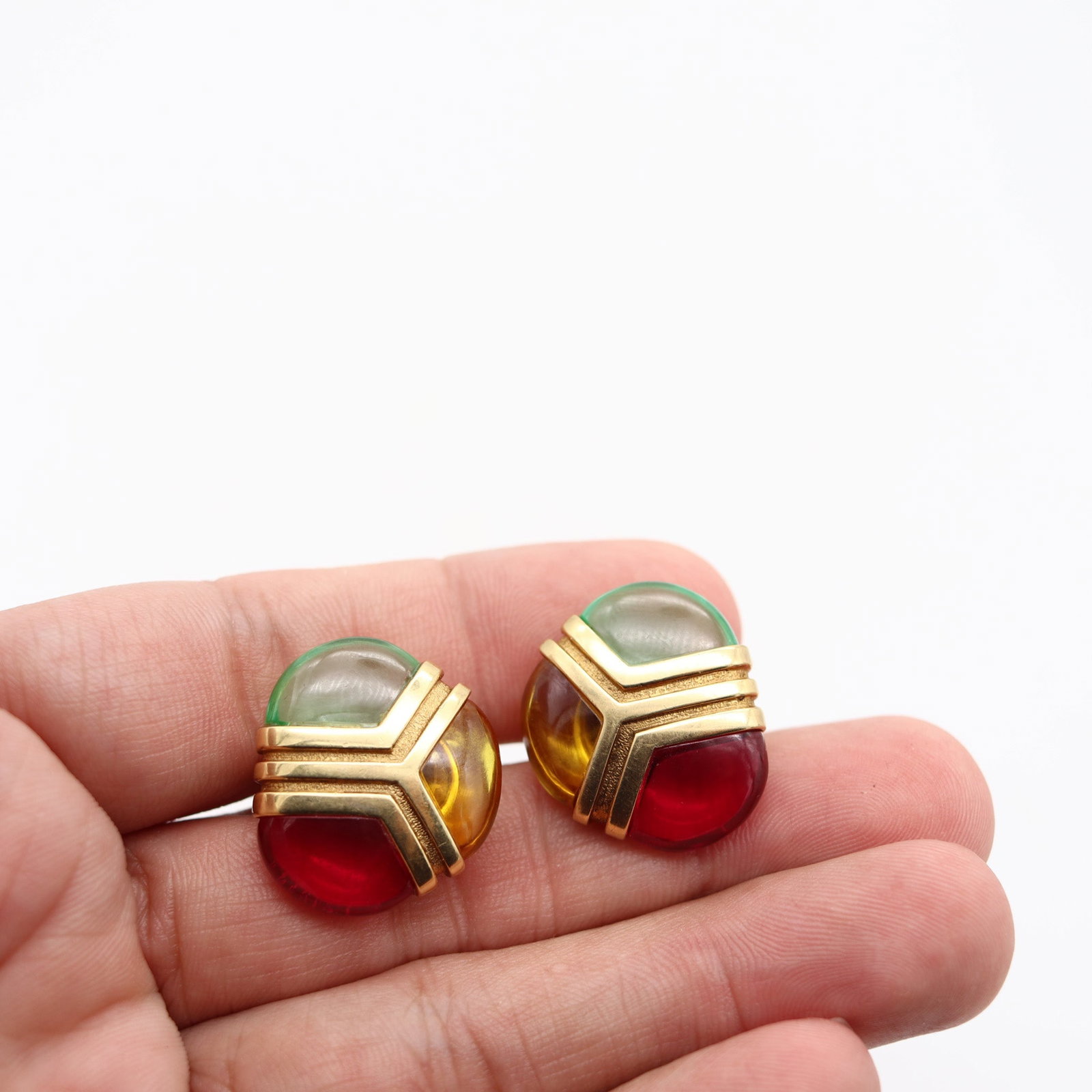 MODERNIST Italian Clips Earrings In Solid 18Kt Yellow Gold With Color Gemstones: Colorful Modernist clip-on earrings, Italy, circa 1990s, masterfully crafted in solid 18K yellow gold with a polished finish. Set with a fine suite of six half-moon cabochon topazes in half-bezel sett