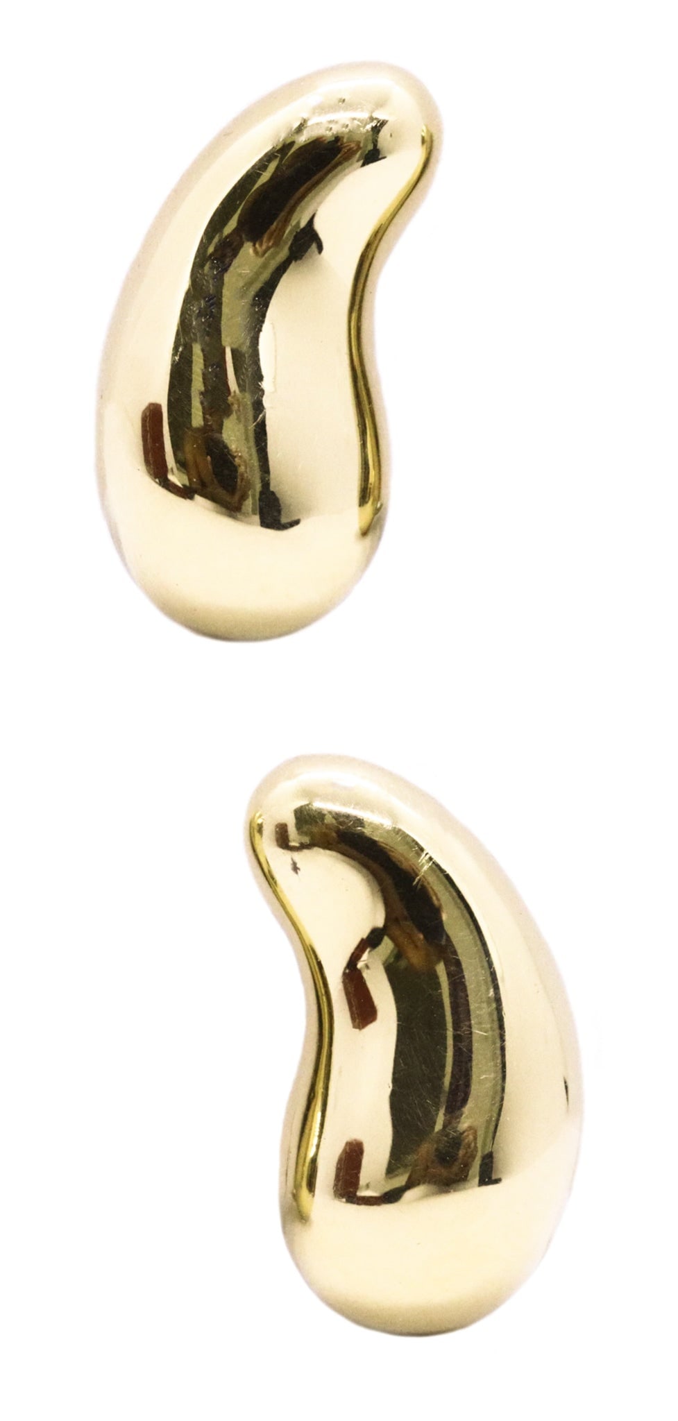 TIFFANY & CO 1970'S ELSA PERETTI 18 KT GOLD LARGE BEANS EAR CLIPS PAIR OF EARRINGS: Iconic Elsa Peretti “Bean” earrings for Tiffany & Co., circa 1970s, hand crafted in solid 18K yellow gold with a high-polish finish and sculptural free-form curves reminiscent of Jean Arp.
