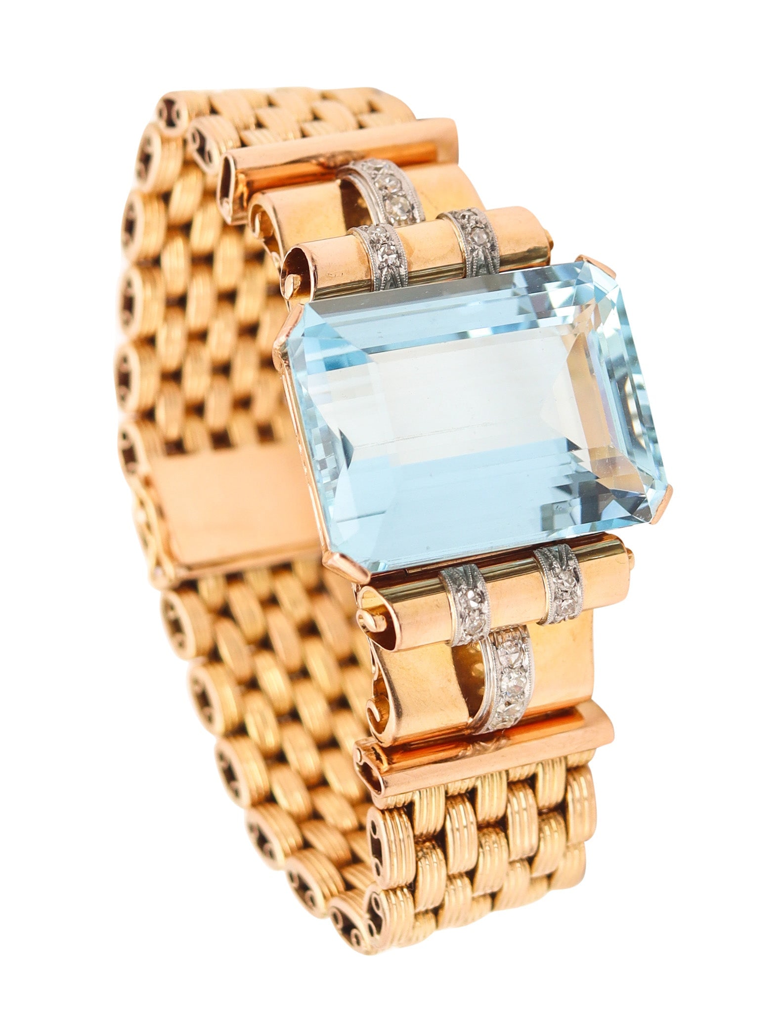 ART-DECO 1940 Retro Bracelet In 18Kt Gold With 61.84 Ctw Aquamarines & Diamonds: Substantial late Art Deco statement bracelet, America, circa 1940s, crafted in solid 18K yellow gold with polished finish and white-gold accents. Centered with a superb emerald-cut Brazilian aquamarin