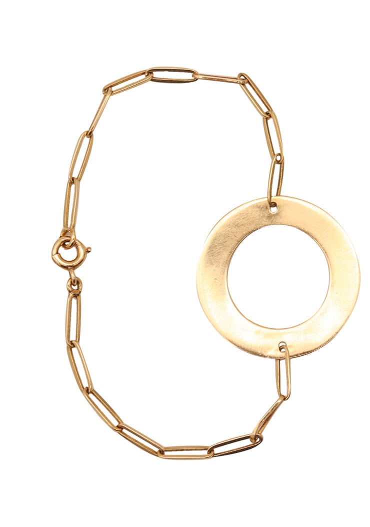 DINH VAN 1970 Paris Modernism TARGET Bracelet In Solid 18Kt Yellow Gold: Rare “Target” collection bracelet by Dinh Van, Paris, circa 1970s, masterfully crafted in solid 18K yellow gold with a sleek geometric modernist design and very high-polish finish. Centere