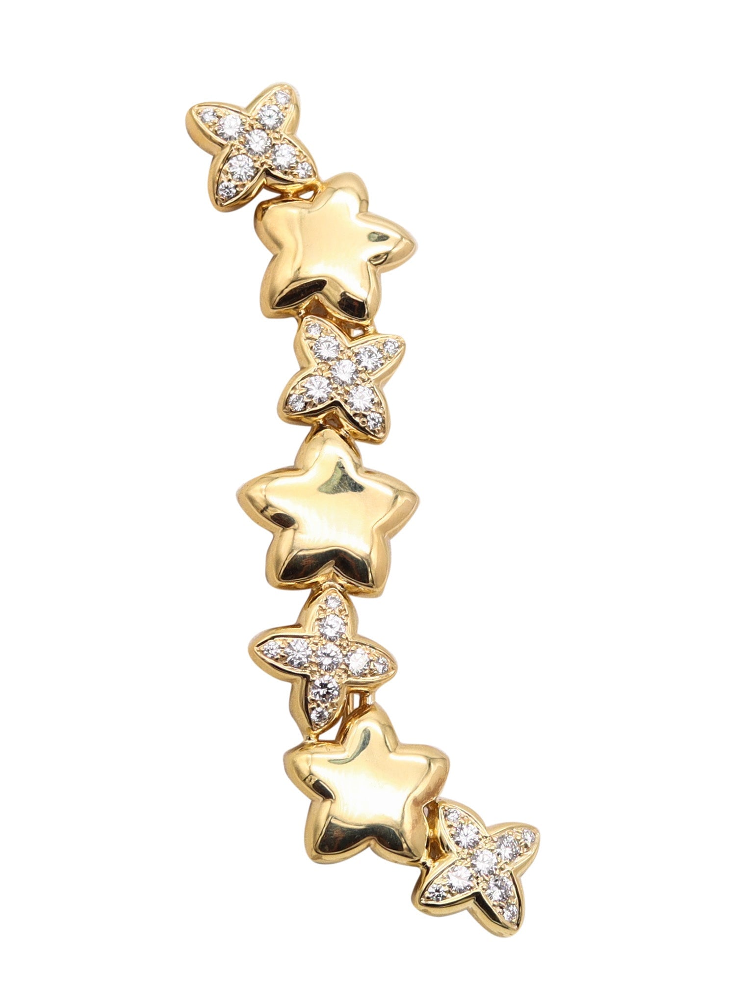 VAN CLEEF & ARPELS Alhambra Brooch In 18Kt Gold With 2.16 Cwt VVS Diamonds: Fabulous large Van Cleef & Arpels brooch, Paris, circa 1990s, crafted in solid 18K yellow gold with a high-polish finish as a composition of stylized Alhambra clover motifs and five-point stars. The c