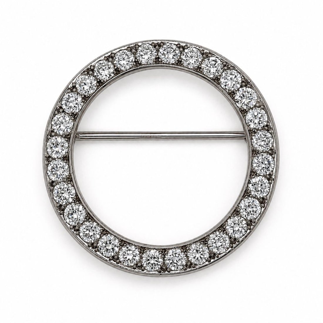 Art Deco Platinum Brooch with 3.60 CTW in Diamonds: Art Deco platinum brooch set with 28 diamonds totaling approx. 3.60 ctw (D?F color, VVS?VS clarity) for exceptional brilliance. Measures approx. 1.25 inches in diameter. Total weight 9.5 grams.