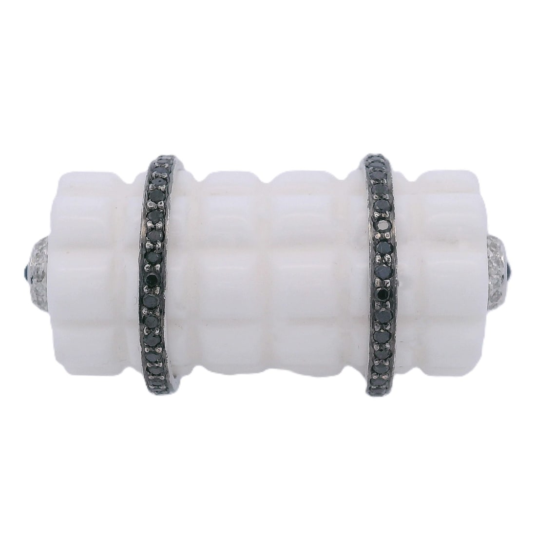 Rare 18K White Gold, White Ceramic, Diamond and Sapphire Ring: Crafted in 18K white gold, this rare and striking ring features a bold textured white ceramic centerpiece embellished with round-cut black and white diamonds weighing approximately 0.65 carat total. T