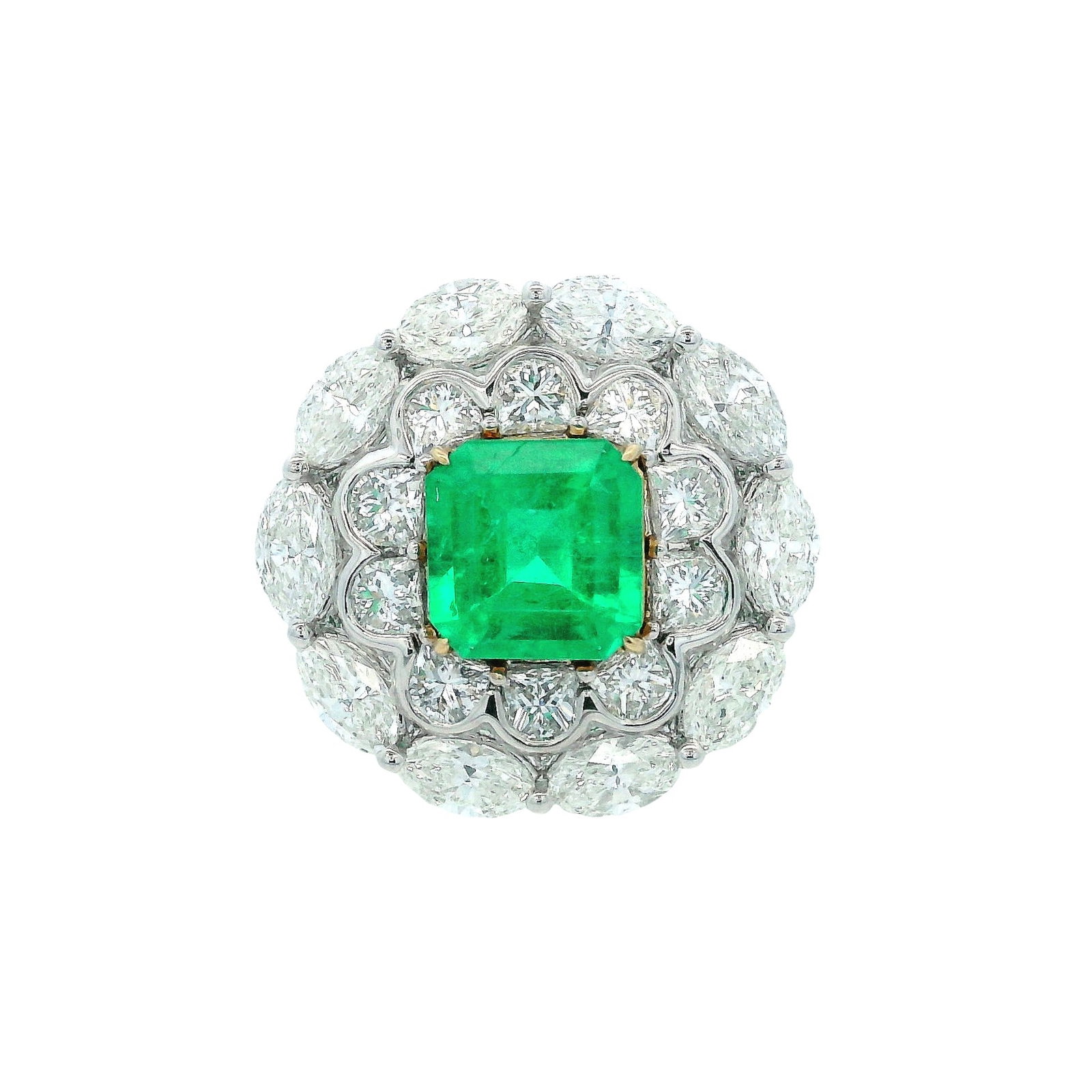 18K White Gold Cocktail Ring with 4.62 CTW in Colombian Emerald & Diamonds: 18K white gold cocktail ring centered with a Colombian emerald approx. 1.62 ctw, framed by a scalloped halo of round diamonds and an outer border of marquise diamonds (as shown), totaling approx. 3.00