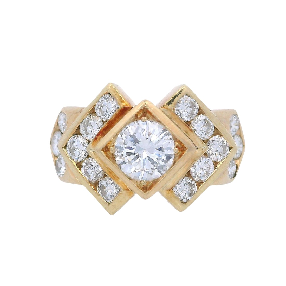 Geometric 18kt yellow Gold with 1.52 Cts in Diamonds: Geometric Ring crafted in 18kt yellow Gold Accented with a center Round cut Diamond Approx. 0.75 carats. H color, VS1 clarity. Along with 16 Round cut Diamonds weighing together Approx. 0.77 carats. H