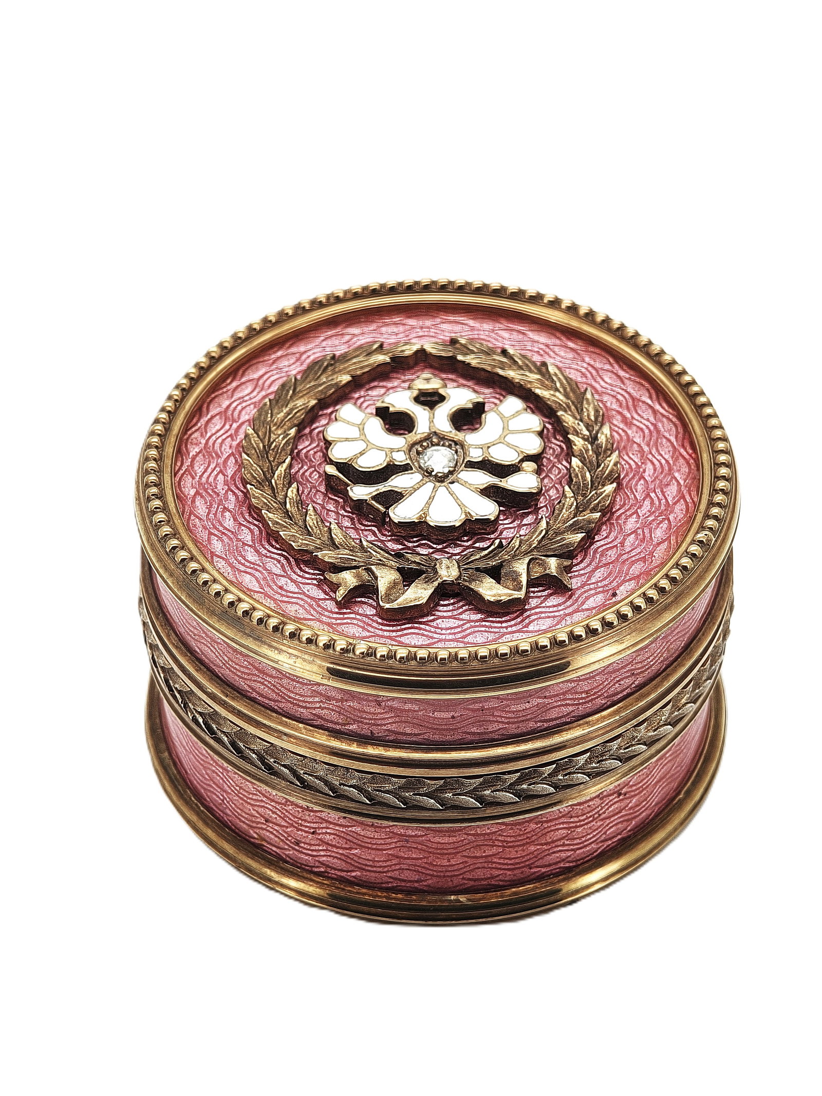 Vintage Russian Imperial Era Gilded Silver Enamel Pill Box: Vintage Russian Imperial-era pill box crafted in gilded silver with pink guilloch?-style enamel, featuring an applied laurel wreath and double-headed eagle motif set with a small diamond accent on the