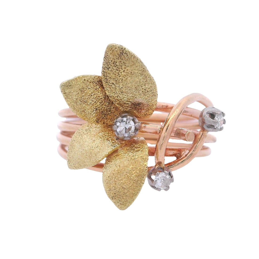 Vintage 18kt yellow Gold Flower Ring with Diamonds: Vintage Flower motif Ring crafted from 18kt yellow Gold accented with three Single cut Diamonds weighing together Approx. 0.10 carats. H color, VS2 clarity. Ring size: 5 1/2. Total weight: 4.7 grams. 