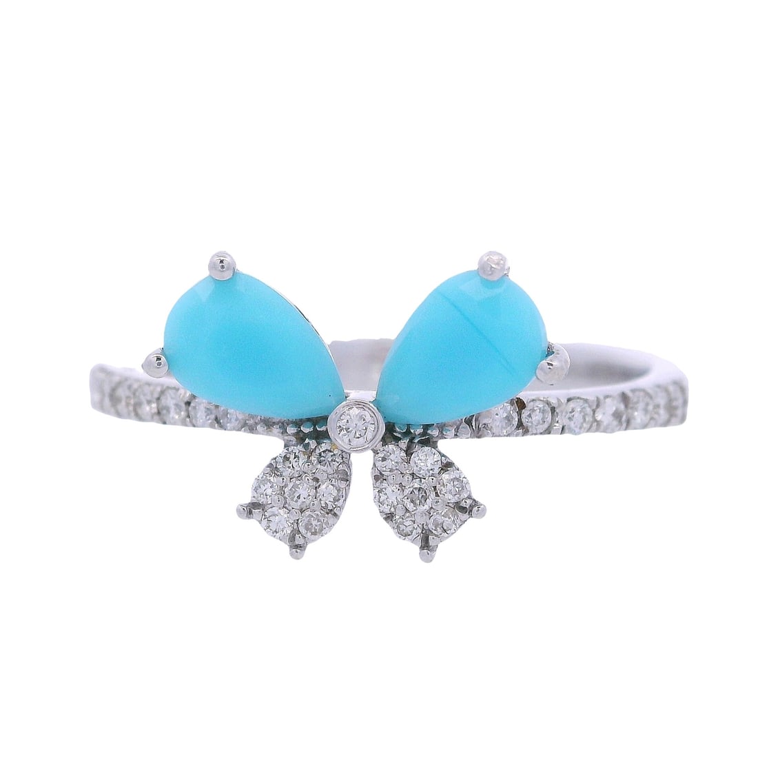 18kt white Gold Butterfly Ring with Diamonds and Turquoises: Butterfly motif Ring crafted in 18kt white Gold Accented with two Pear shaped Turquoises. Along with Round cut Diamonds weighing Approx. 0.30 carats. H color. Ring size: 7 1/2. Total weight: 3.3 grams