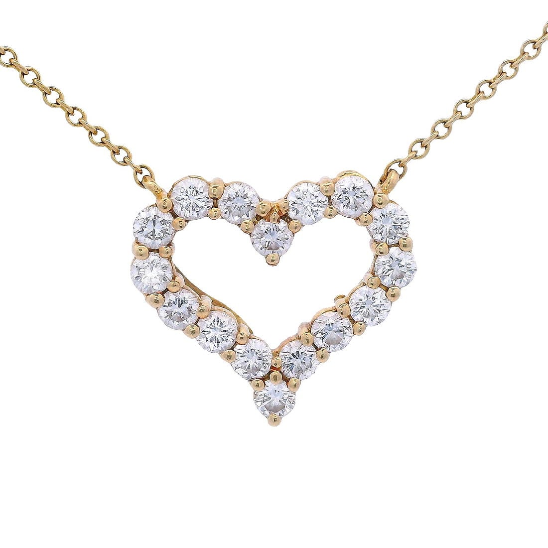 Tiffany & Co. 18kt yellow Gold Heart Necklace with 0.80 Cts in VVS Diamonds: Beautiful Heart Necklace By Tiffany & Co. Crafted from 18kt yellow Gold. Accenter with 16 Round cut Diamonds weighing together 0.80 carats. F-G color, VVS clarity. Heart measurements: 0.55 x 0.61 inch