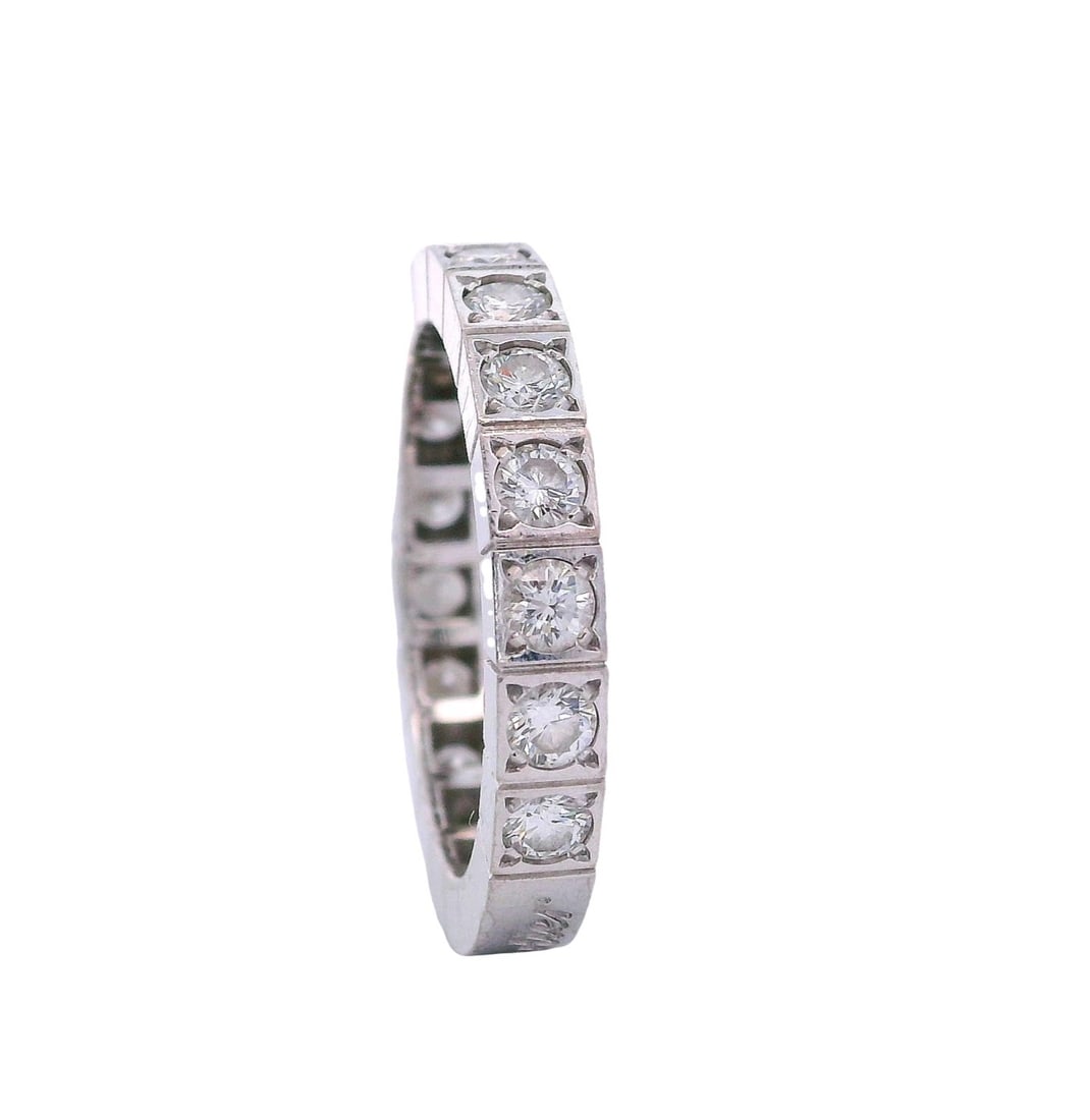 CARTIER Lanier 18kt white Gold Eternity Band with Diamonds: Cartier Eternity band crafted rom 18kt white Gold from the Lanier Collection. Accenter with 17 Round brilliant cut Diamonds weighing Approx. 1.35 carats. D-E color, VVS1 clarity. Ring size: 5 3/4. Rin