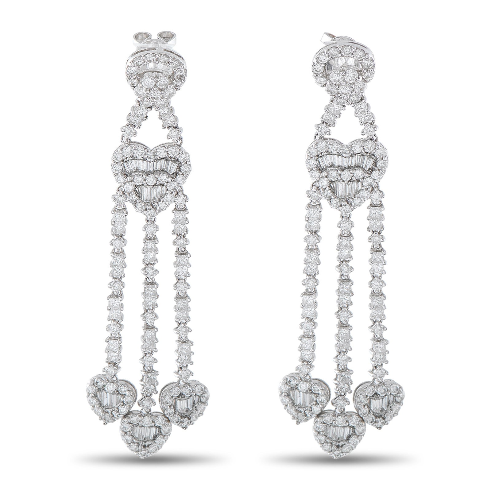 18K White Gold 3.60ct Diamond Heart Drop Earrings: Crafted in 18K white gold, these drop earrings are built around a vertical composition of heart-shaped diamond clusters. Each heart combines round and baguette-cut diamonds, arranged to emphasize shap