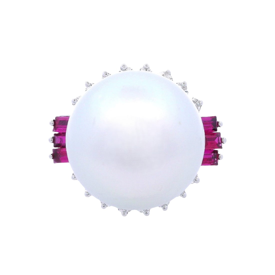 18kt white Gold Cocktail Ring with Pearl, Diamonds & Rubies: 18kt white Gold Cocktail Ring crafted form . Set with a center Round white Pearl of about 17.60 mm diameter. Accenter with 16 Round cut Approx. 0.90 carats. J-K color, VS2 clarity. Along with six Bagu