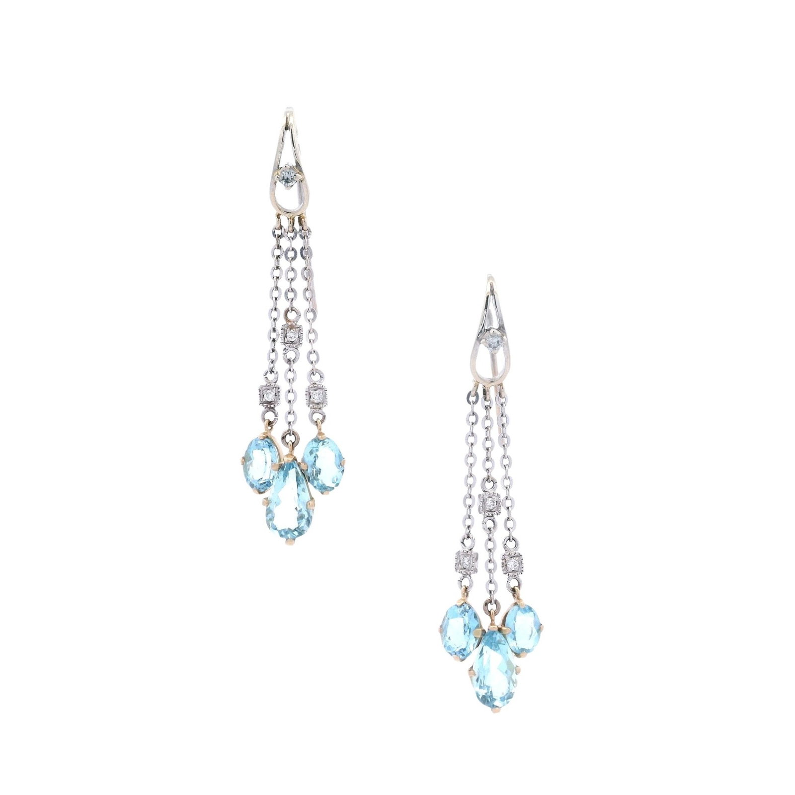 18kt two tones Dangling Earrings with Aquamarines & Diamonds: Pair of dangling Earrings crafted in 18kt white and yellow Gold, featuring six Brazilian Aquamarines weighing together Approx. 5.50 carats. Accenter with eight Round cut Diamonds weighing together App