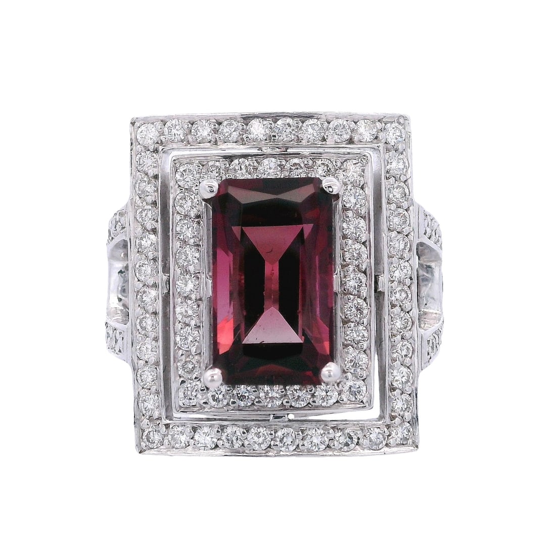 18kt white Gold Cocktail Ring with Tourmaline & Diamonds: 18kt white Gold Cocktail Ring featuring a center Red Tourmaline of Approx. 5.0 carats. Accenter with Round cut Diamonds weighing Approx. 1.30 carats. H color. Ring size: 7. Total weight: 14.0 grams. R