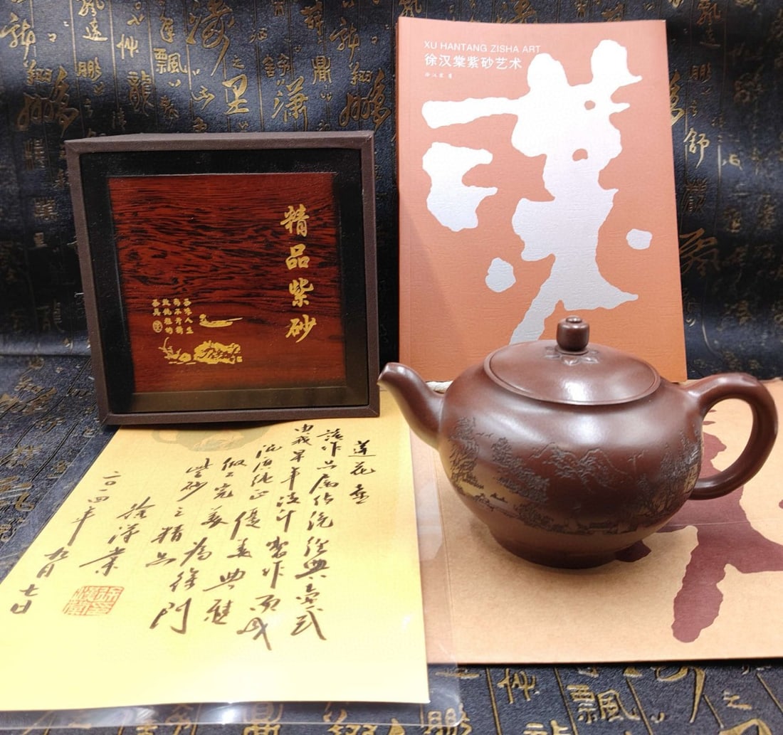 Lotus Pot: Product Name: Lotus Teapot (Lower Style) Brand: Xu Hantang Size: 20 x 12 cm Capacity: 380cc Clay: Original Ore Bottom Groove Clear Clay Provenance:from the collection of George Stopher, Kent,