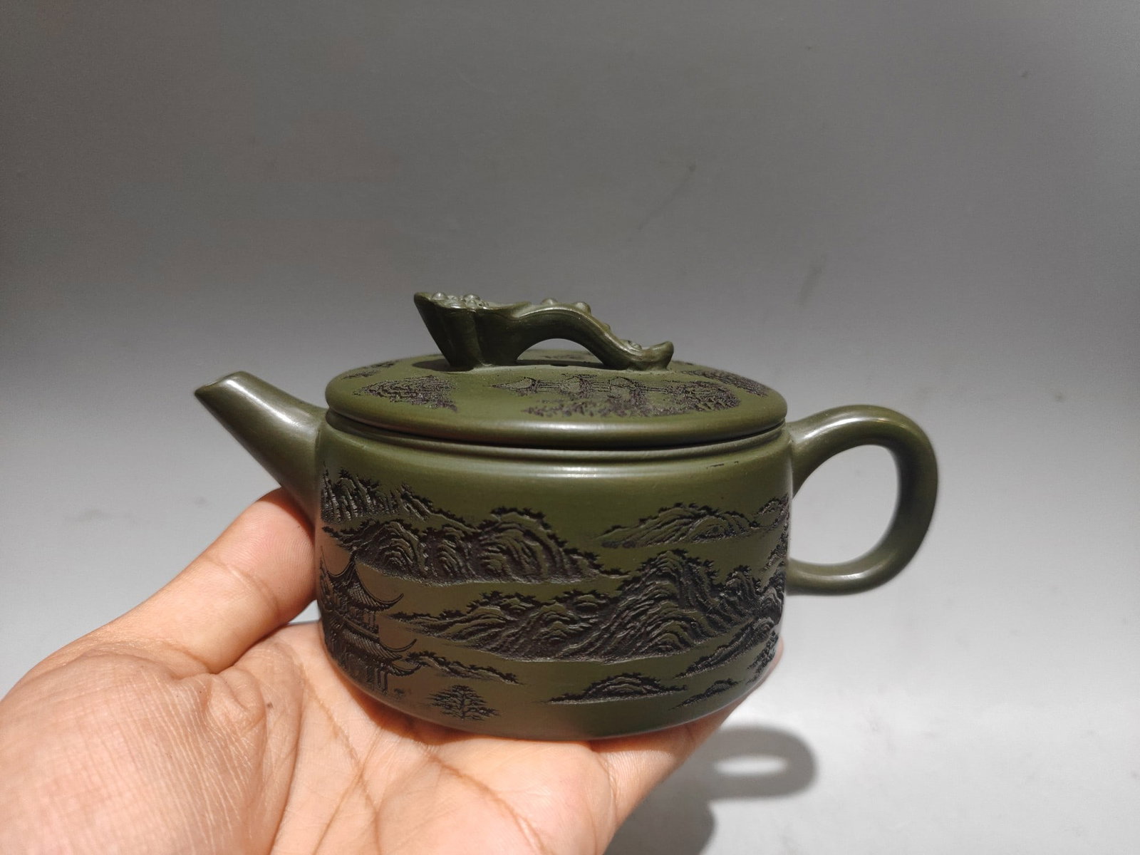 Hanwa pot: Product Name: Han Tile Teapot; Bottom Mark: Gu Jingzhou; Size: 15 x 7 cm; Capacity: 240cc; Clay: No. 4 Well Old Green Clay Provenance:from the collection of George Stopher, Kent, purchased from P&M