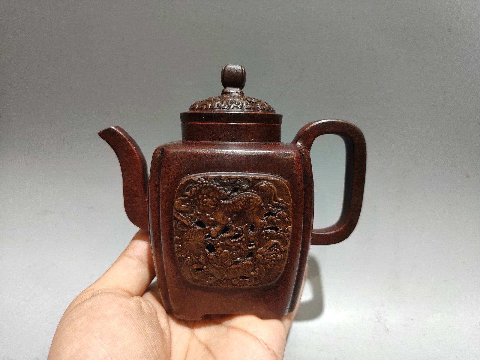 Square hollowed-out teapot: Product Name: Square Hollow Teapot (Lower Style) Brand: Gu Jingzhou Size: 14 x 12 cm Capacity: 260cc Clay: Original Red Clay Provenance:from the collection of George Stopher, Kent, purchased from P&M 