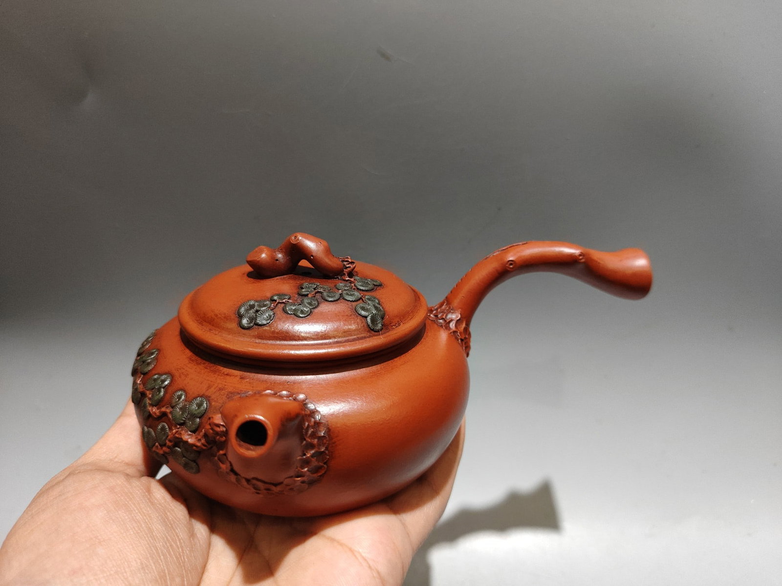 Side-handled teapot: Product Name: Side-handled Teapot; Bottom Mark: Jiang Rong; Size: 18 x 8 cm; Capacity: 260cc; Clay: Original Zhu Ni (red clay) Provenance:from the collection of George Stopher, Kent, purchased from P&