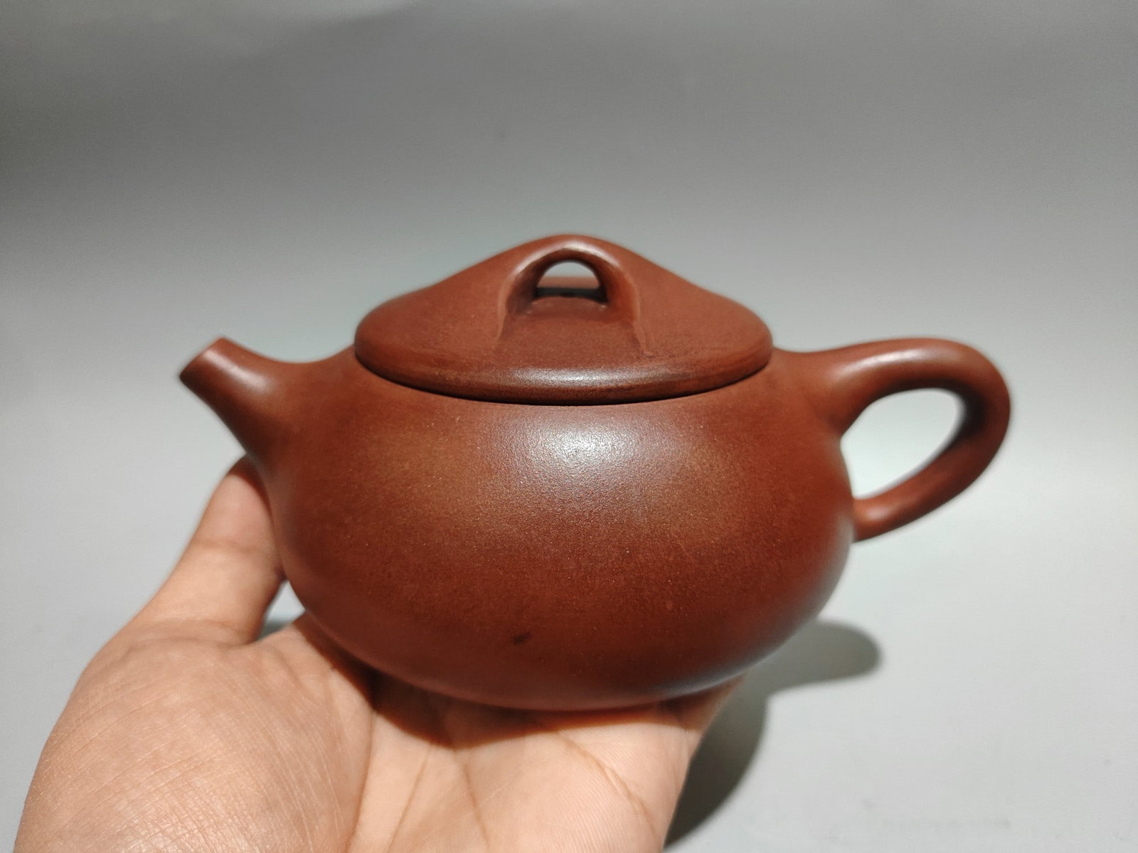 Stone Ladle Teapot: Product Name: Stone Ladle Teapot; Bottom Mark: Made by Shao Jingnan; Size: 17 x 8 cm; Capacity: 360 cc; Clay: Original Red Clay Provenance:Private collection from a professor in University of