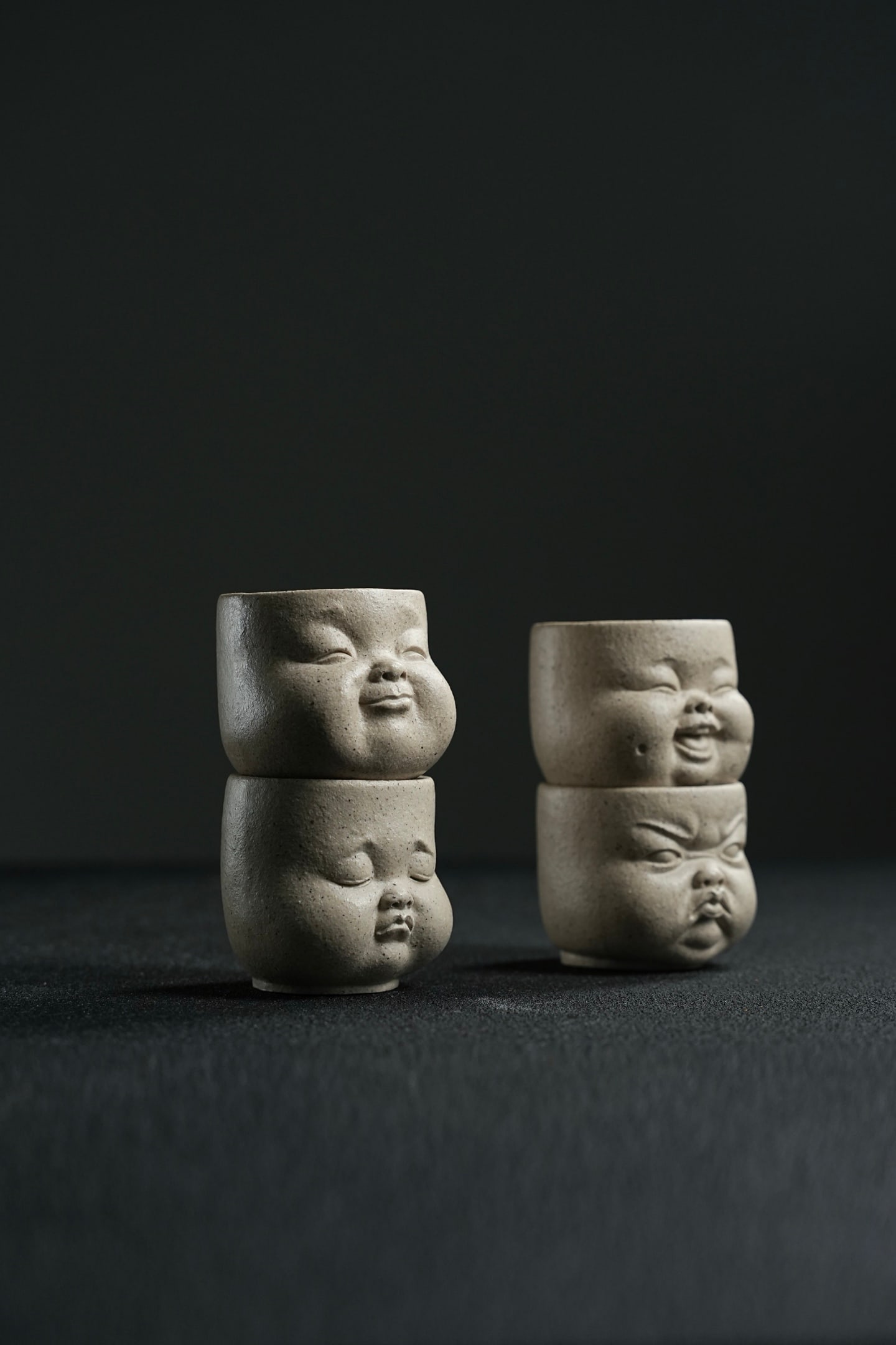 Joy, Anger, Sorrow, and Happiness X Four-Phase Master Cup: The Joy, Anger, Sorrow, and Happiness Four Phases Master Cup (130cc) is made of premium white jade with a soft and smooth texture. The design captures the four phases of life: joy, anger, sorrow, and 