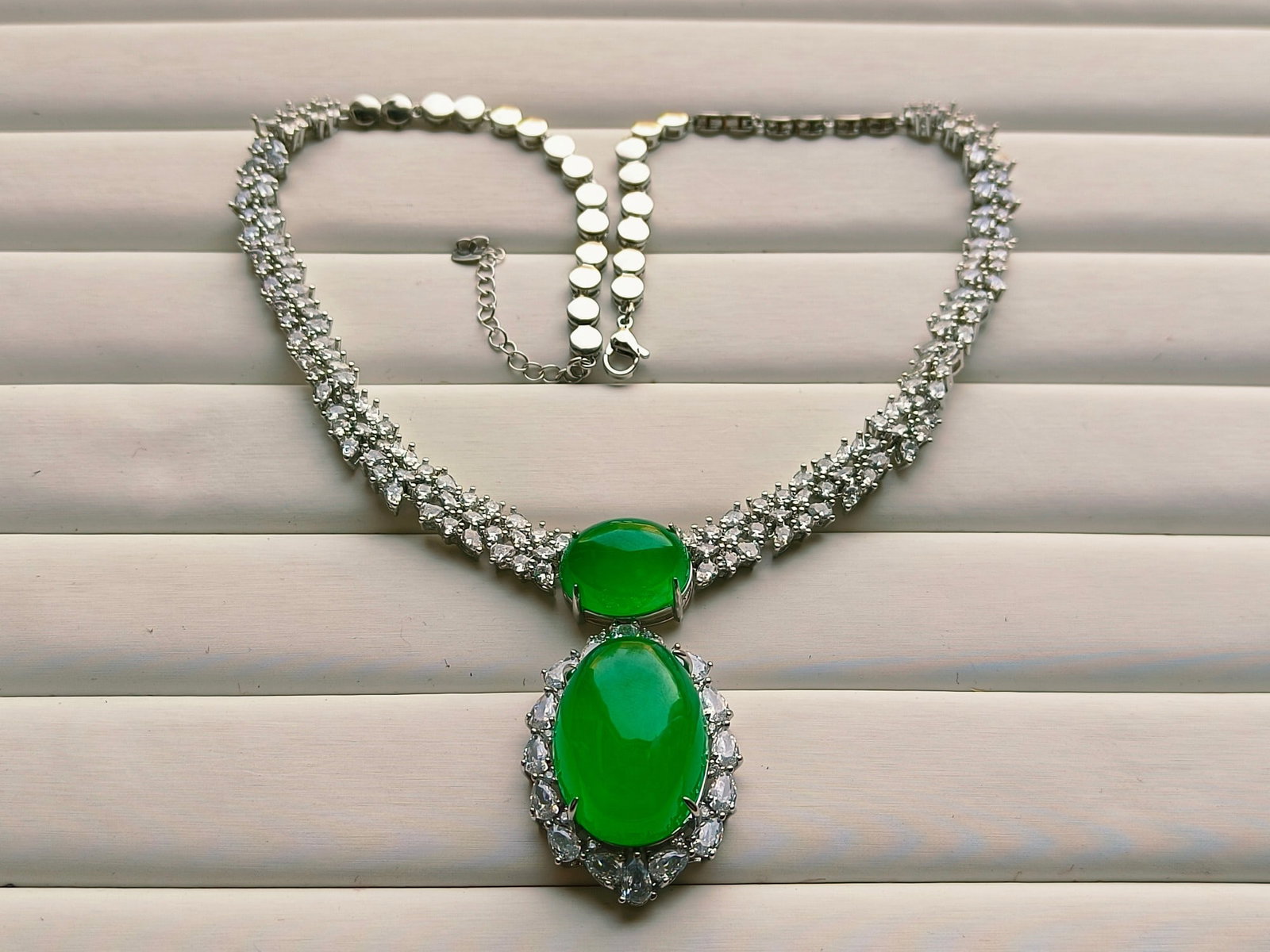 Dragon Stone Type Imperial Green Jadeite Large Cabochon Necklace: Dragon Stone Type Imperial Green Jadeite Large Cabochon Necklace Provenance:From a private collection in Sussex, United Kingdom. We have an in-house shipping department to ensure your post-purchase pr