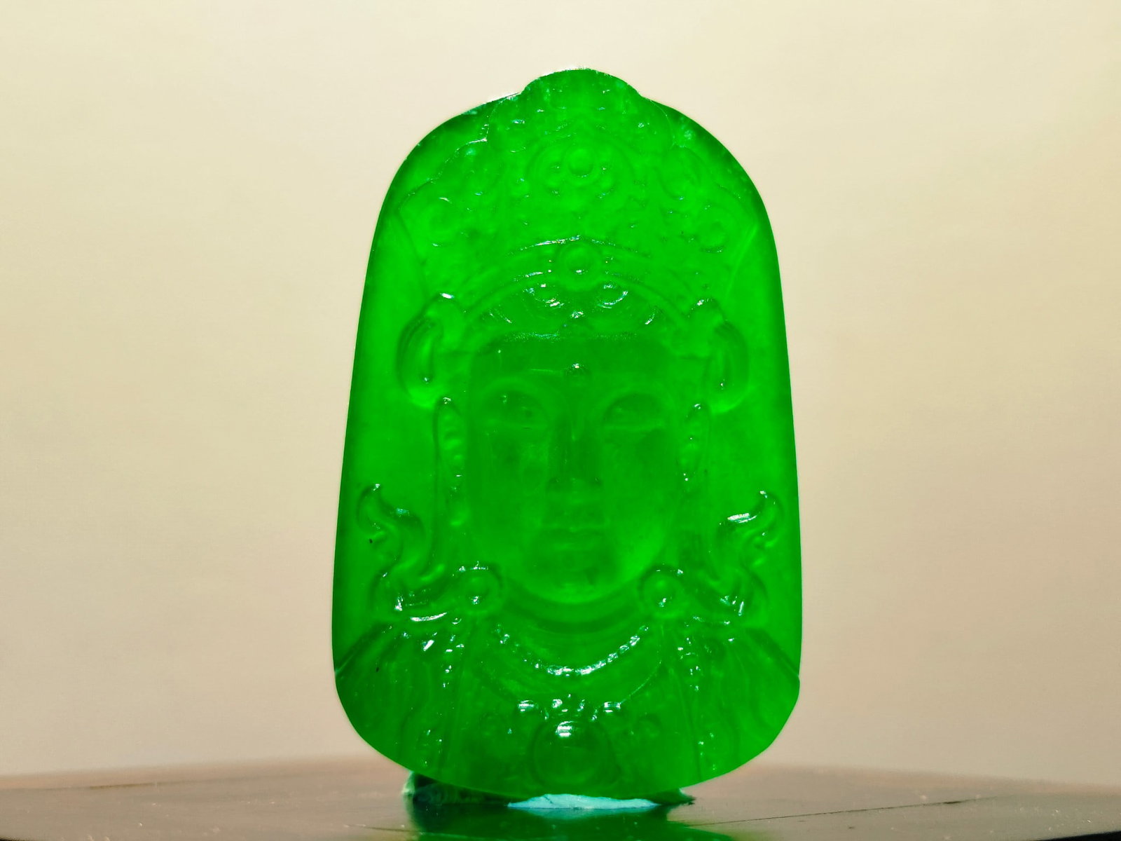 Dragon Stone Imperial Green Jadeite Buddha Pendant: Dragon Stone Imperial Green Jadeite Buddha Pendant Provenance:from the collection of George Stopher, Kent, purchased from P&M Waldo Antiques, London. We have an in-house shipping department to ensure 