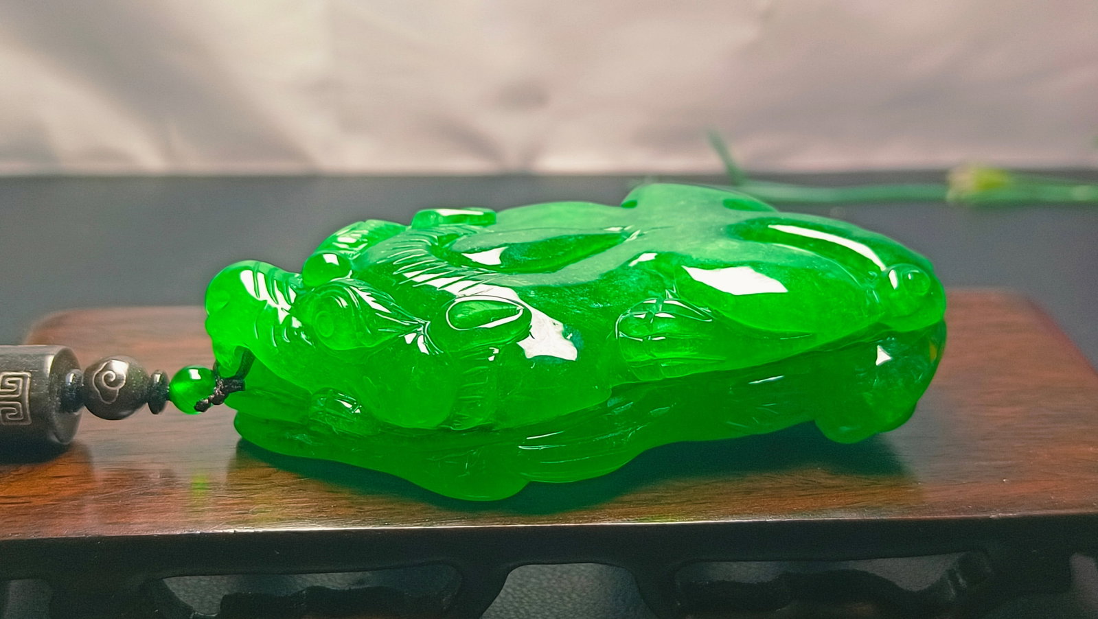 Dragon Stone Type Imperial Green Jade Pixiu Hand-held Piece: Dragon Stone Type Imperial Green Jade Pixiu Hand-held Piece Provenance:from the collection of George Stopher, Kent, purchased from P&M Waldo Antiques, London. We have an in-house shipping department t