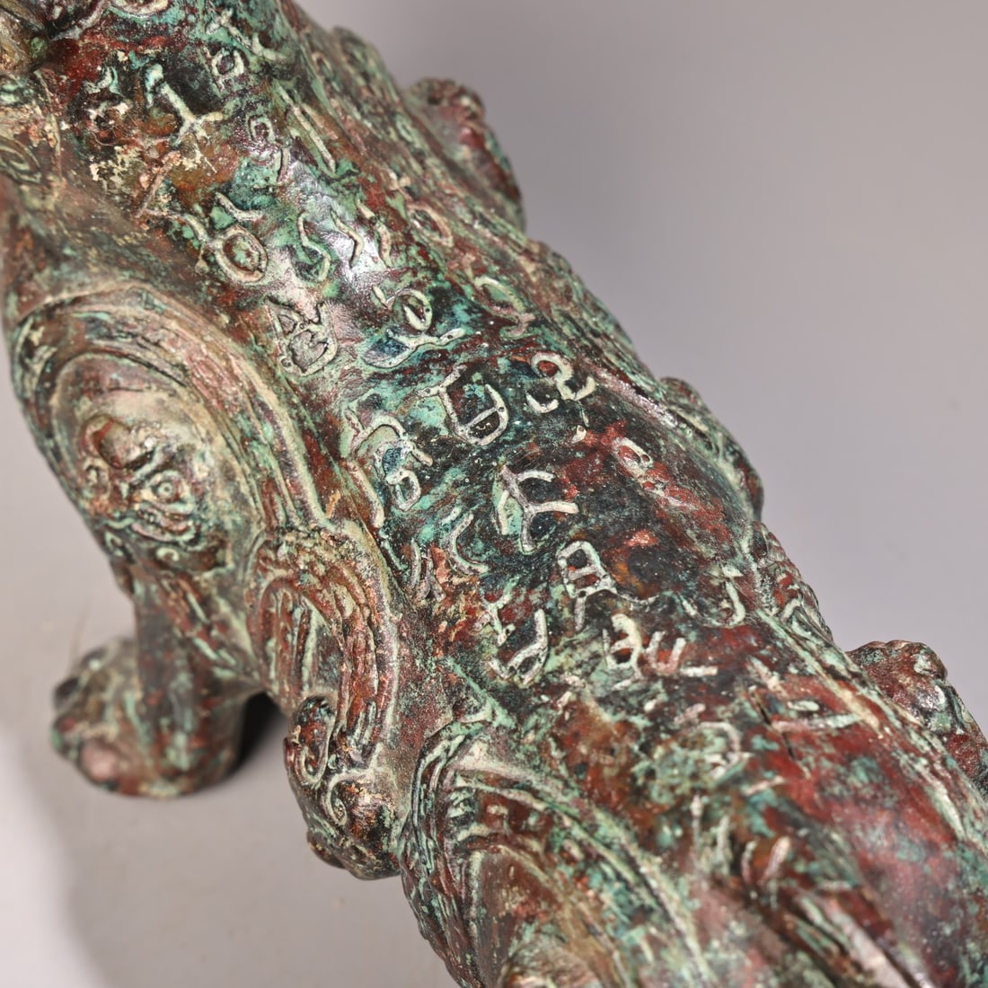 Rare bronze artifacts with inscriptions depicting reptiles and animals. - 7