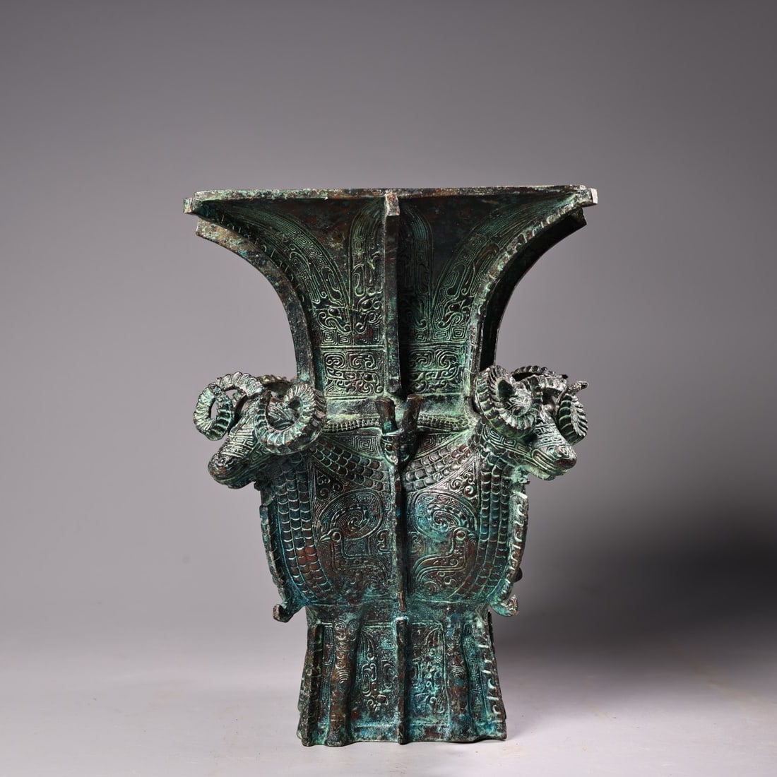 Rare Collection of Bronze Four-Sheep Square Zun: This rare bronze vessel, inlaid with gold, is a masterpiece of craftsmanship and exquisite in form and design. It weighs 2800g and measures 25cm in height and 21cm in width. Provenance:from the collec