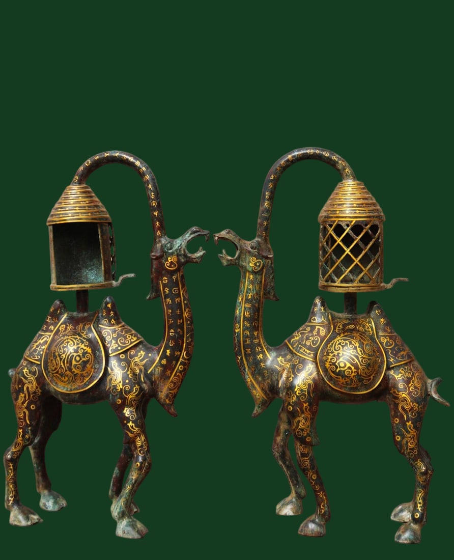 A camel-shaped palace lantern, a Western Zhou dynasty bronze artifact unearthed from the collection.: The Han Dynasty bronze horse inlaid with gold weighs 6560g, is 50cm long, 16cm wide, and 48cm high. Provenance:from the collection of George Stopher, Kent, purchased from P&M Waldo Antiques, London. W