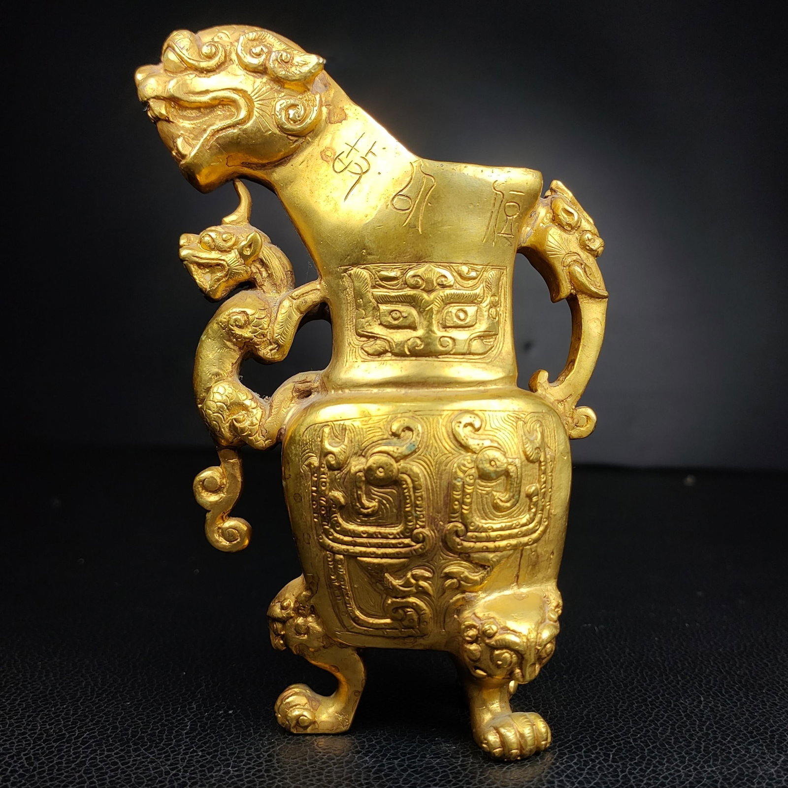 Formerly owned gilt bronze animal-shaped zun (1 of 8)