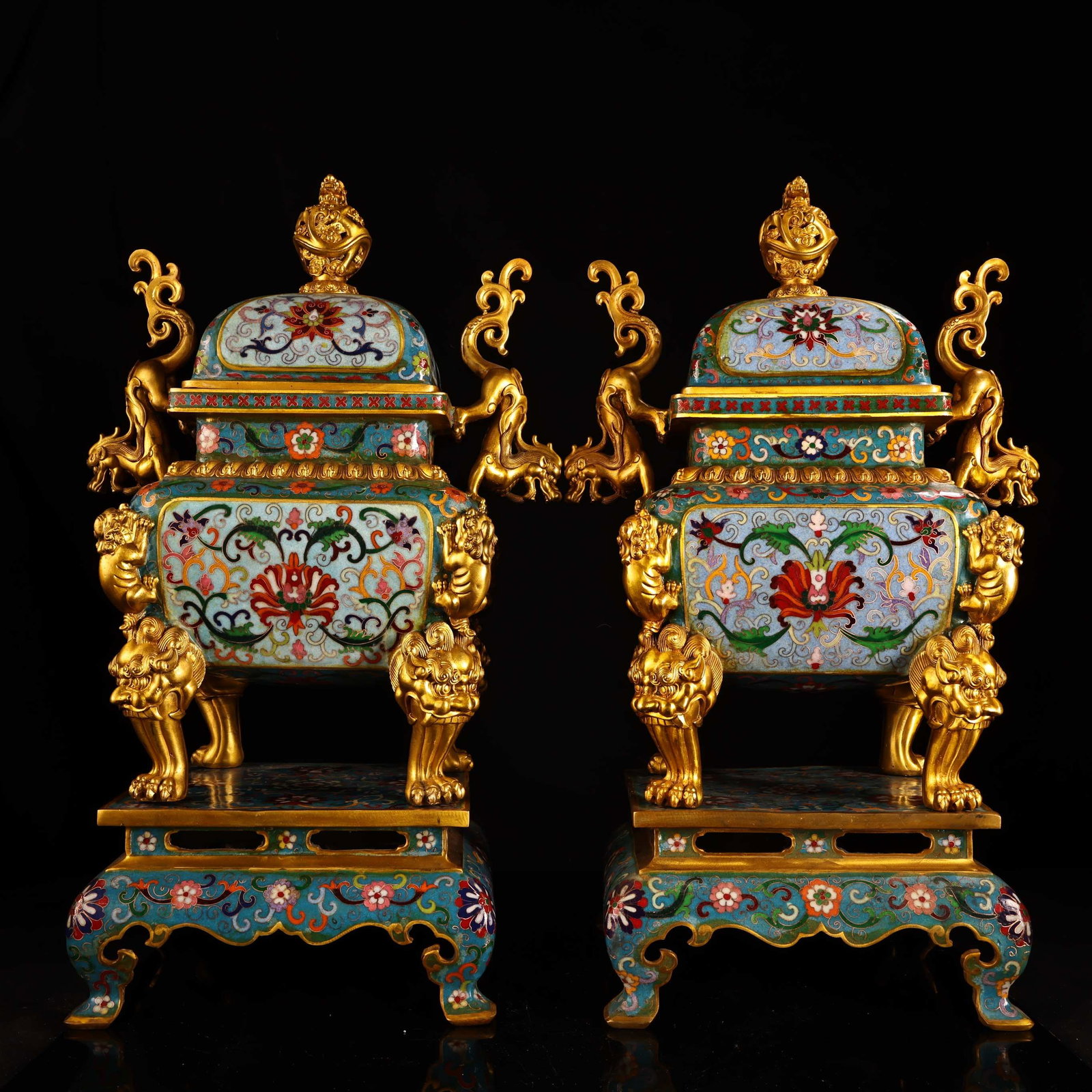 A pair of pure copper cloisonne gilt incense burners with high relief engraving and chasing, now: A pair of exquisite cloisonne enamel and gilt incense burners, crafted from pure copper with high relief engraving and chasing, from a rare collection. Each burner weighs 11,000g and measures 56cm in 
