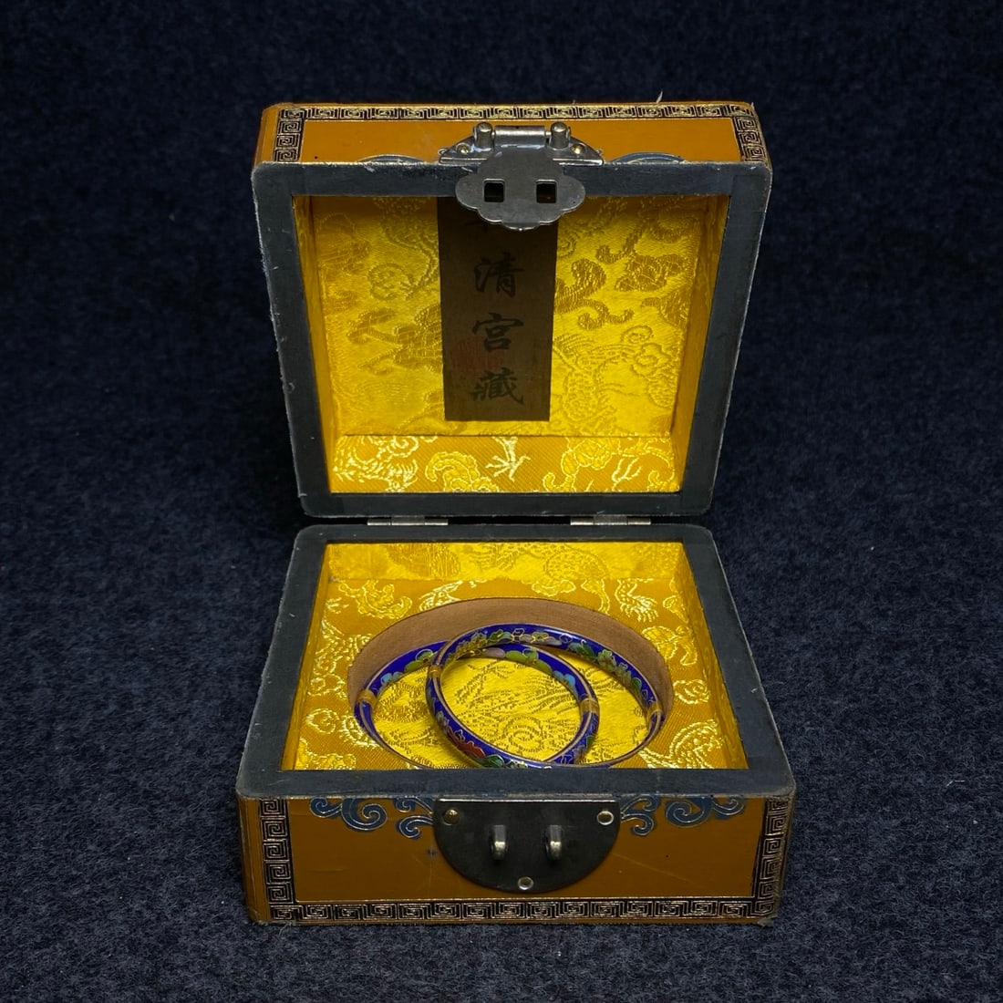 A bronze cloisonne enamel bracelet, treasured in a Qianlong imperial lacquerware collection box. (1 of 8)