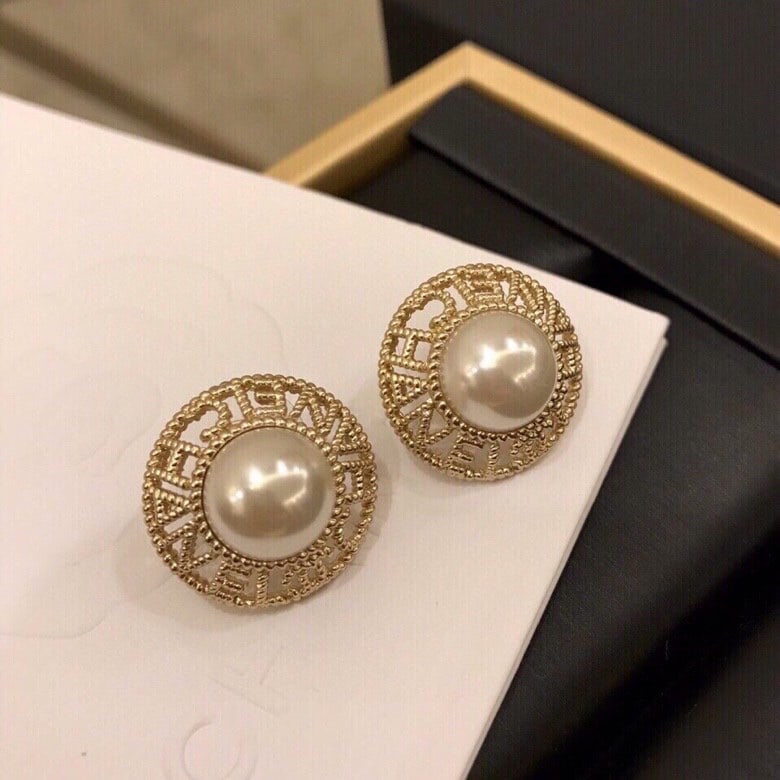 Chanel earrings: Chanel earrings are fashionable and versatile; beautiful things don't need a fancy background to look stunning and elegant in a casual photo. We offer FREE SHIPPING for both domestic and international