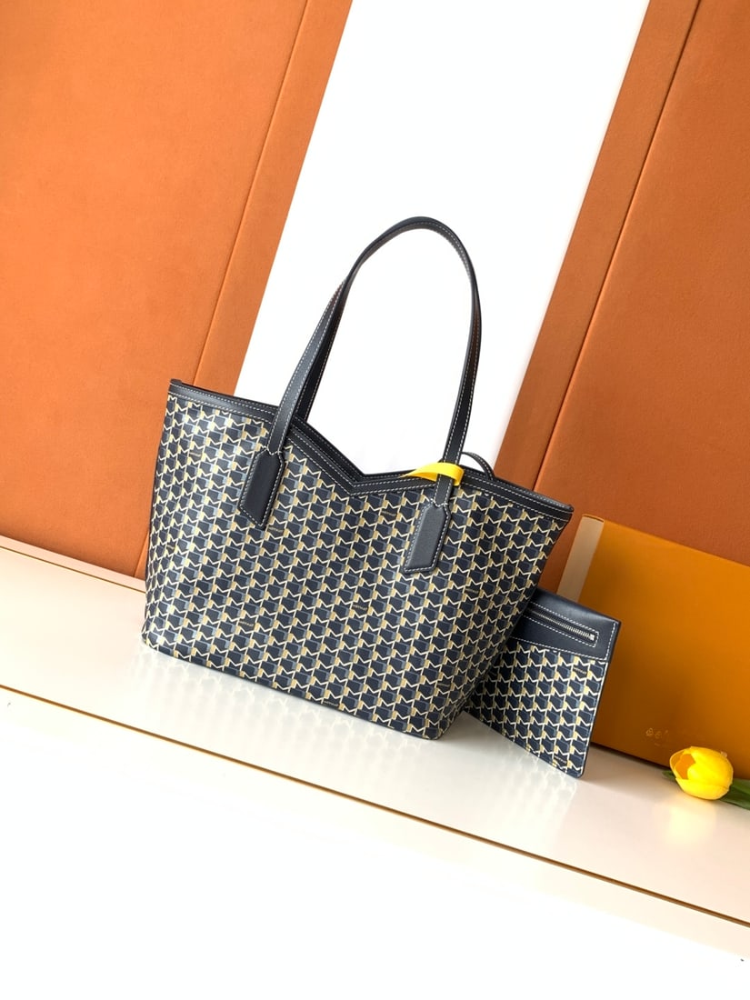 Moynat Canvas Tote Bag: The Canvas series tote bag is designed to keep all your daily essentials organized and readily accessible for everyday outings. The "M" shaped cutout and contrasting stitching at the opening create a 