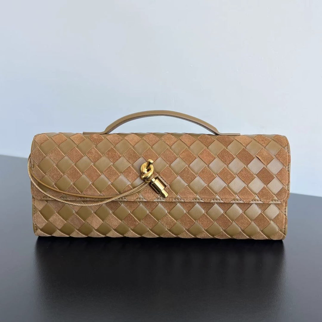Bottega Veneta Clutch: This Bottega Veneta suede clutch is a perfect addition to any fall/winter wardrobe. The brown suede bag is stunning, crafted from classic woven lambskin and suede. It's instantly recognizable as a fal