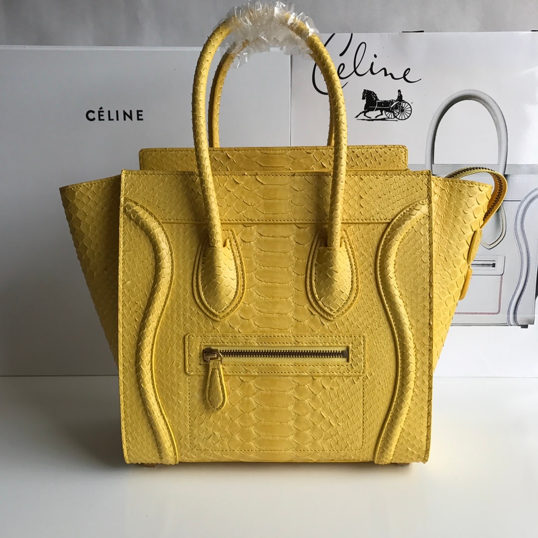 Celine: Smiley face snakeskin bag, yellow, size 27 cm We offer FREE SHIPPING for both domestic and international clients.We accept wire transfer and card payment, for the convenience of international clients'
