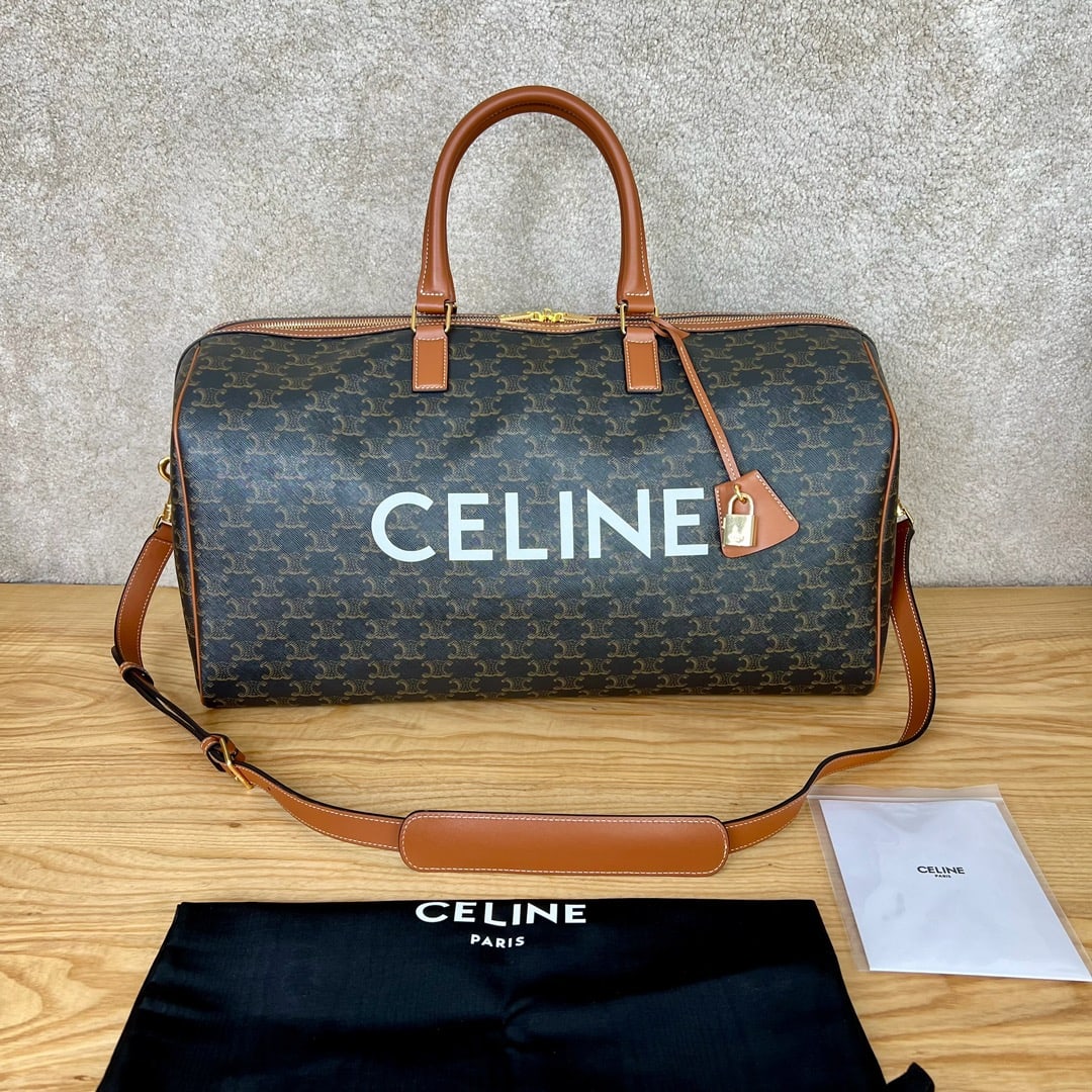 Celine print and logo print travel bag: Large printed and logo-print travel bag, 50 x 27 x 23 cm, logo print, cowhide leather trim, fabric lining, double zipper handles for carrying, shoulder bag, and crossbody, leather handles, detachable 