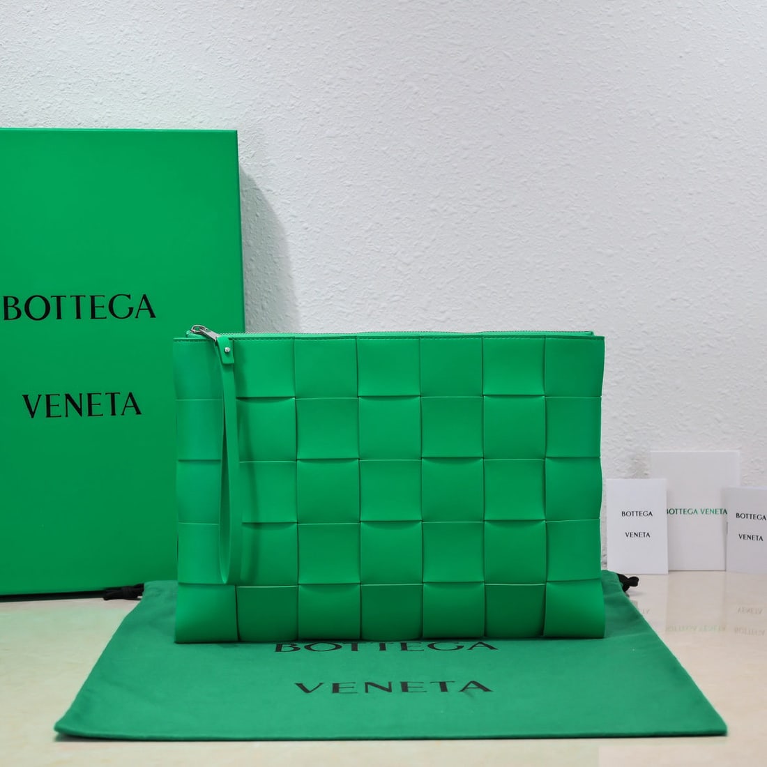 Bottega Veneta: Bottega Veneta 2022 Large Woven Lambskin Handbag. This handbag continues the iconic woven craftsmanship of previous models. The leather is exquisitely fine and incredibly soft to the touch. The