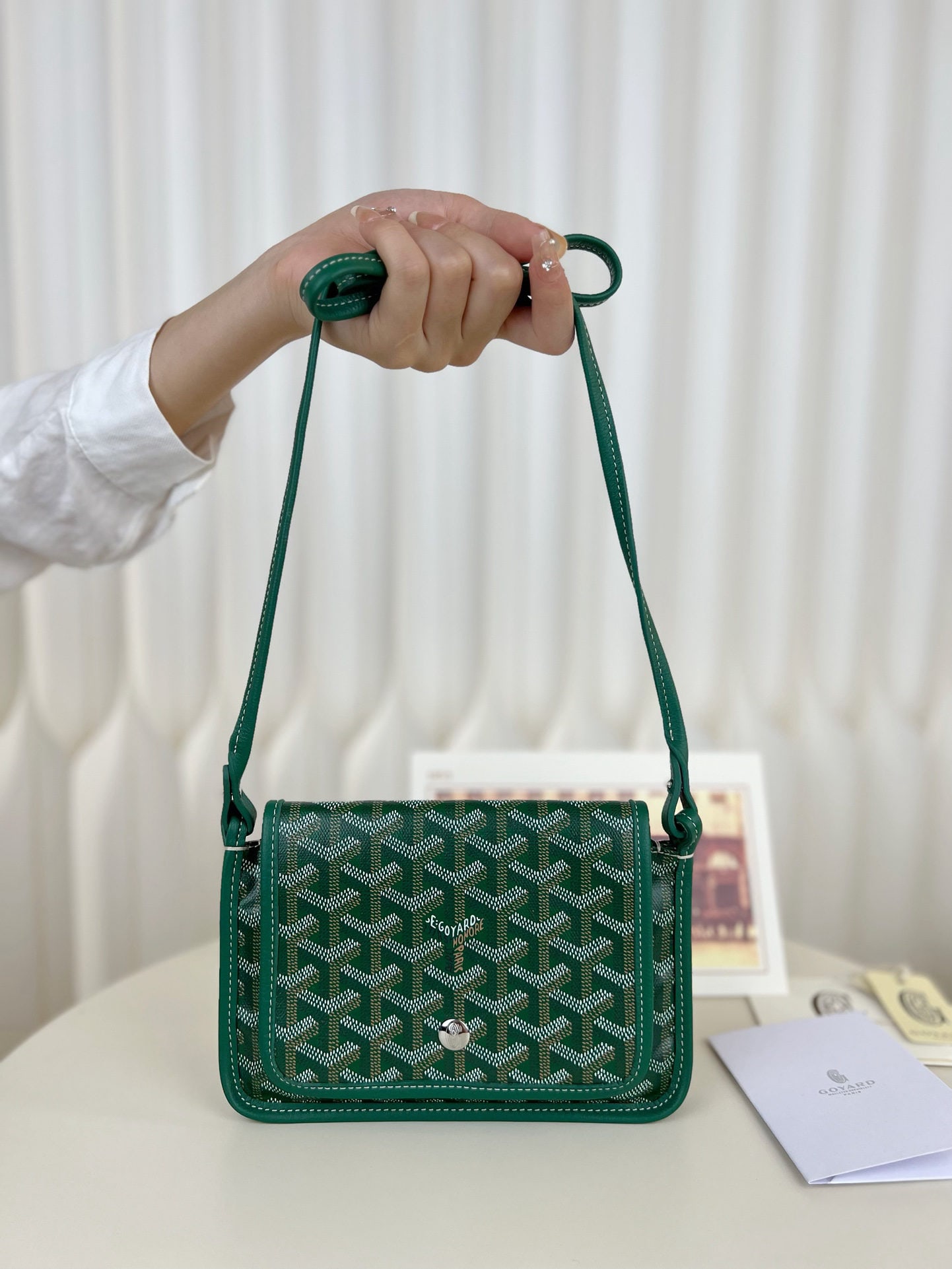 Goyard plumet: The Goyard plumet envelope bag is a lightweight pouch you can easily sling over your shoulder and head out. Despite its slim design with three compartments, it easily holds everyday essentials like yo