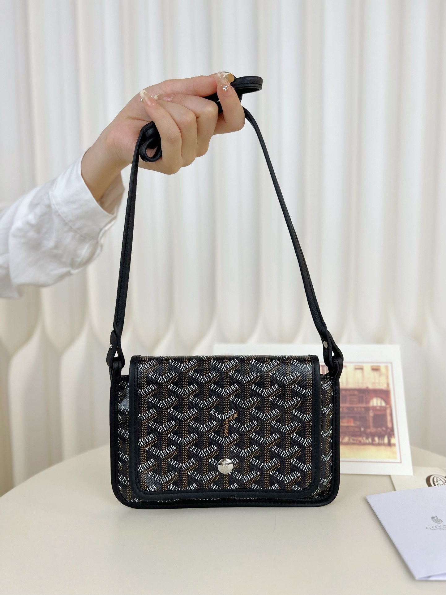 Goyard plumet: The Goyard plumet envelope bag is a lightweight pouch you can easily sling over your shoulder and head out. Despite its slim design with three compartments, it easily holds everyday essentials like yo